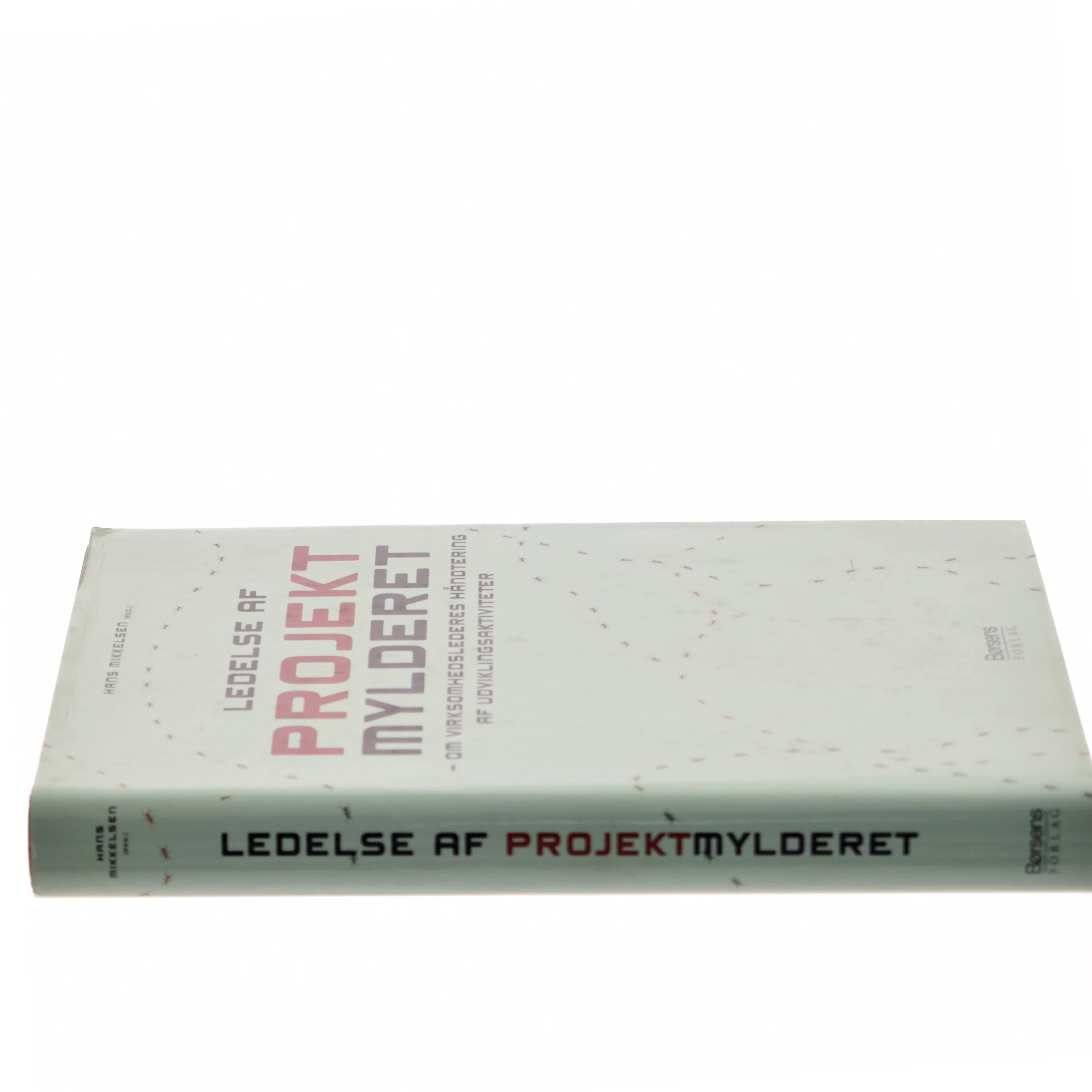 Ledelse af projektmylderet : om virksomhedslederes håndtering af udviklingsaktiviteter af Hans Mikkelsen (f. 1934) (Bog)