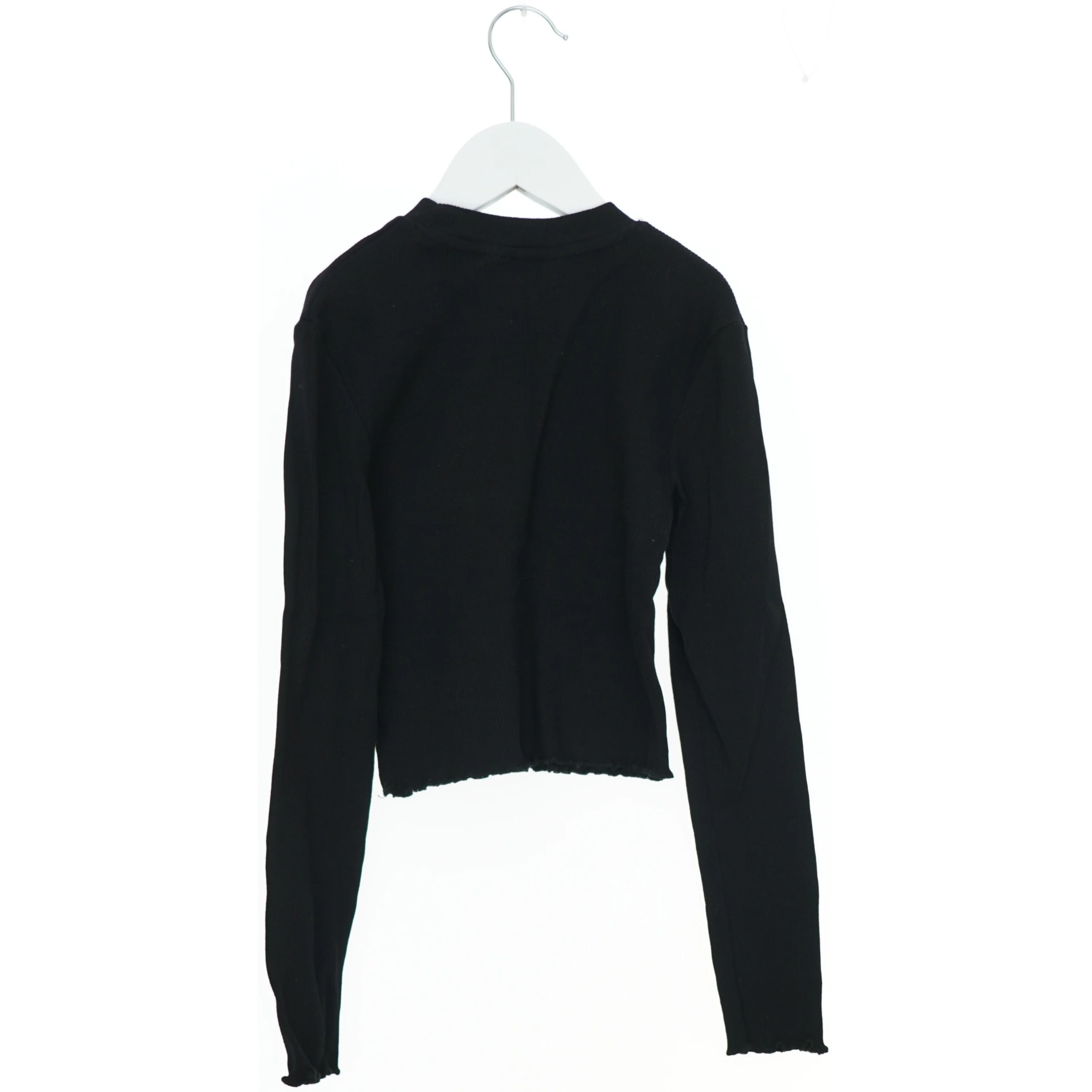 Langærmet sort bluse med tekst fra H&M (str. 140)