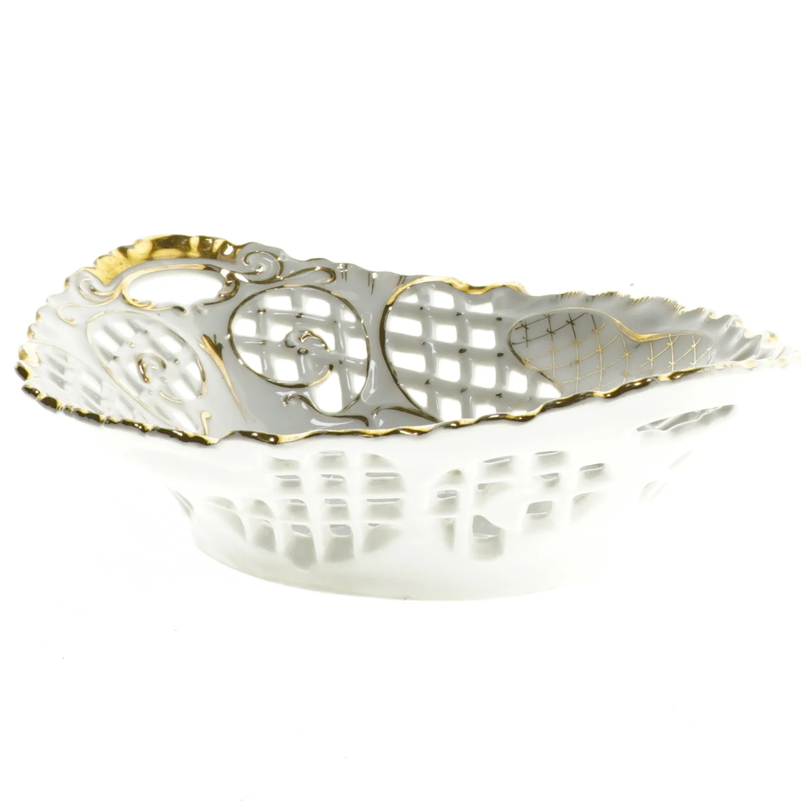 Porcelænsskål med gennembrudt mønster og guldkant (str. 29 x 30 cm)