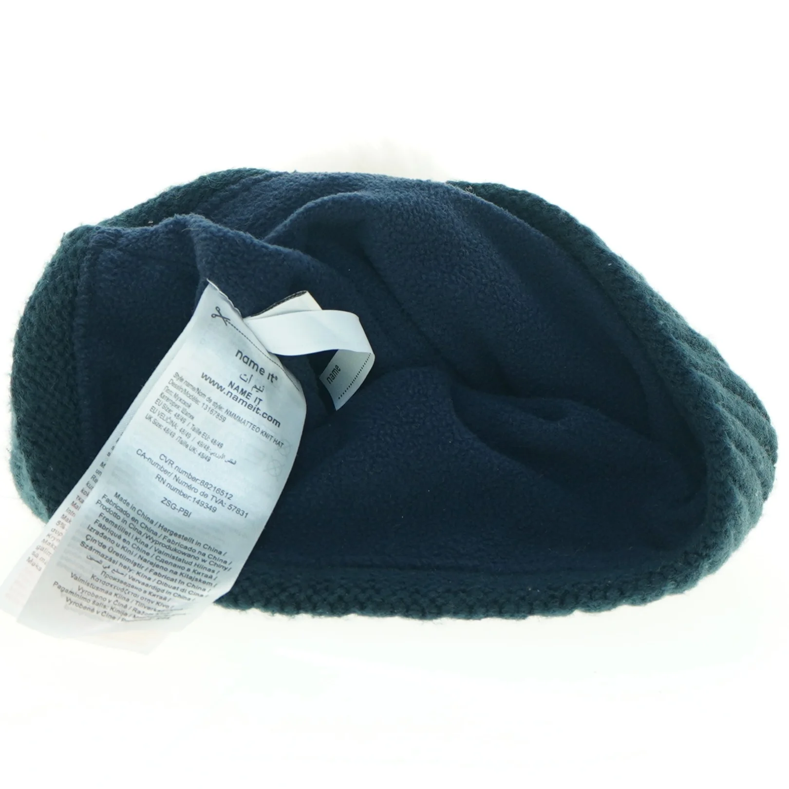 Strikhue med pompon og rensdyrmønster (str. Et til 2 år)