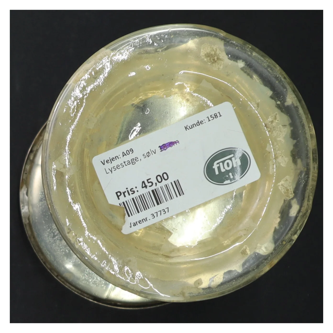 Glas lysestage med sølvfarvet finish (str. H. 19 cm)