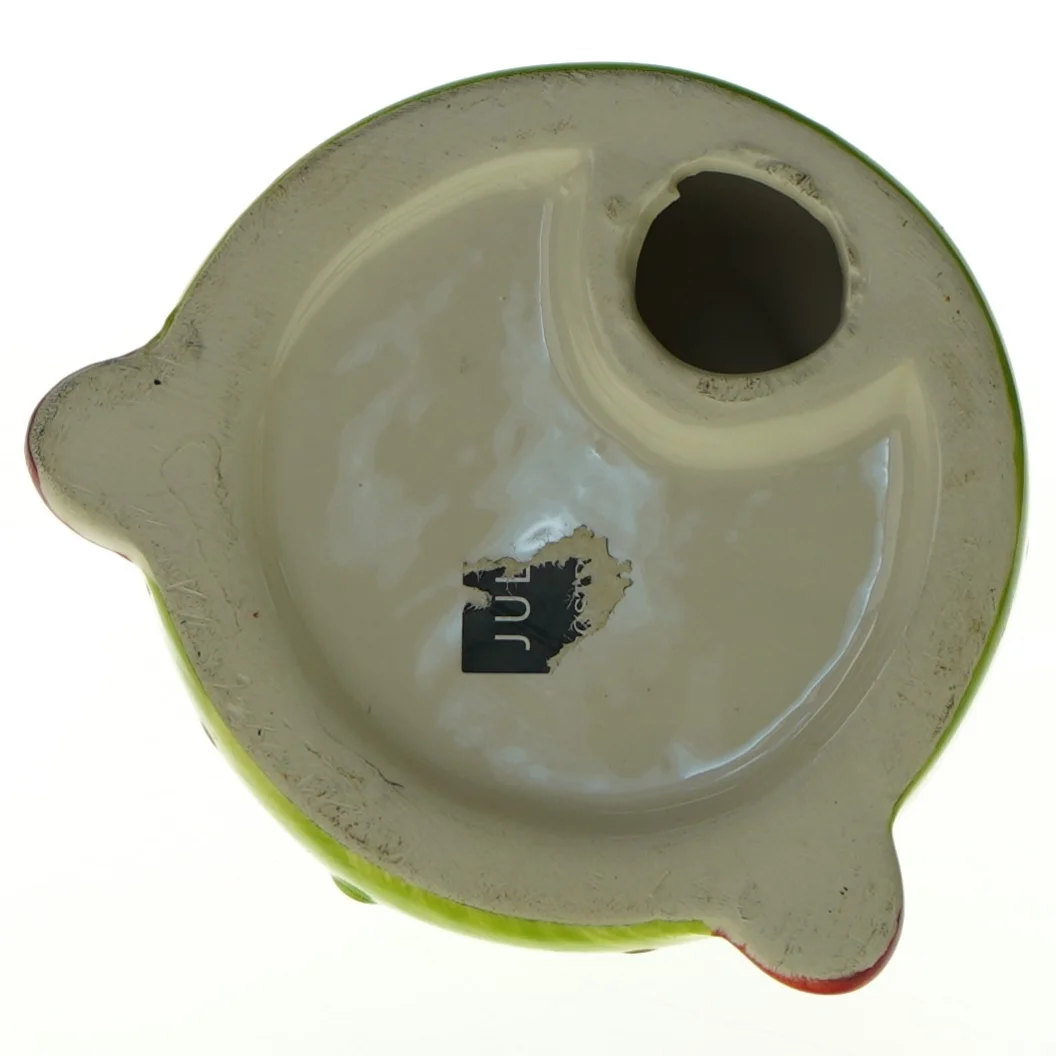 Keramiknisse med lysgrøn kappe