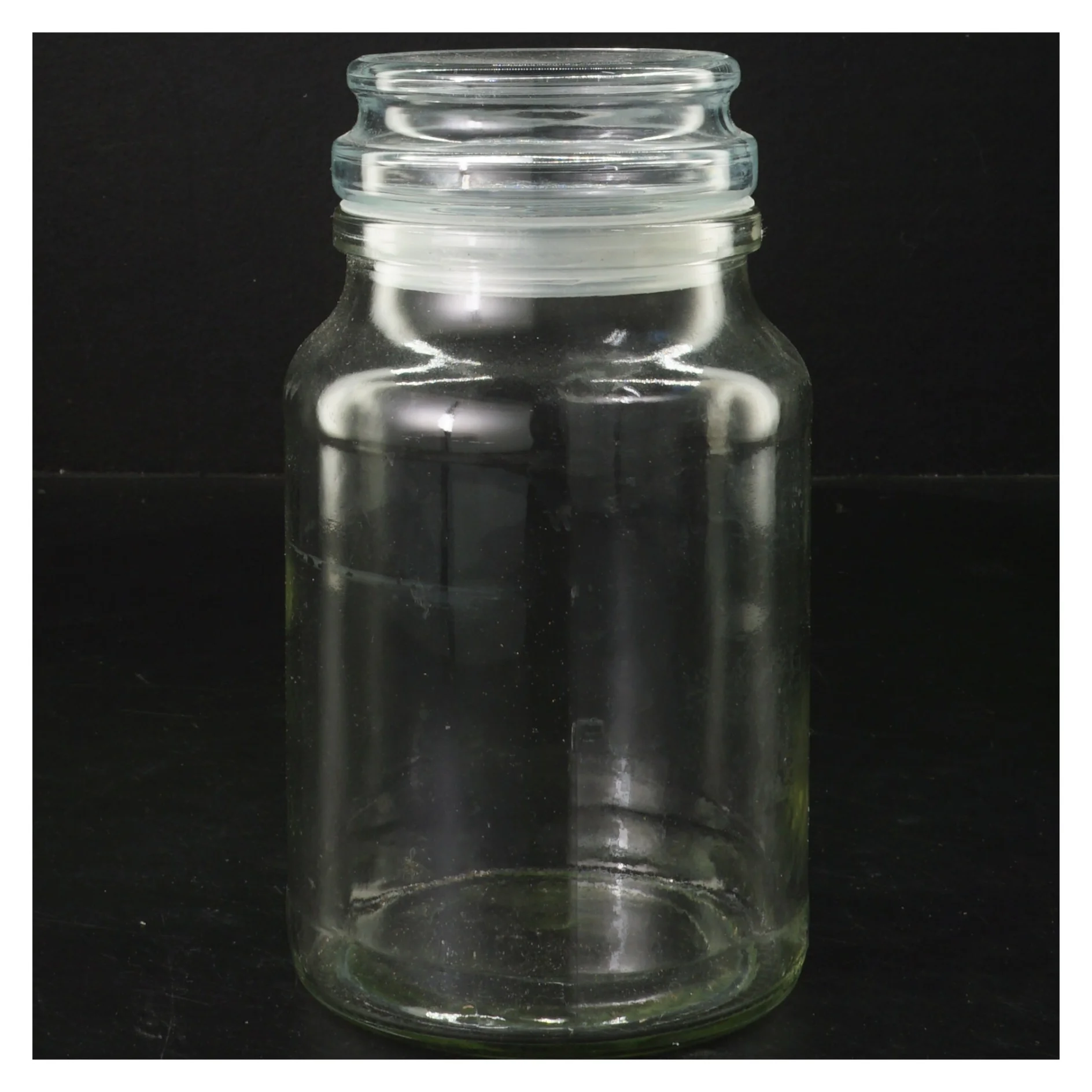 Glaskrukke med låg (str. Ø 8 cm længde 17,5 cm)