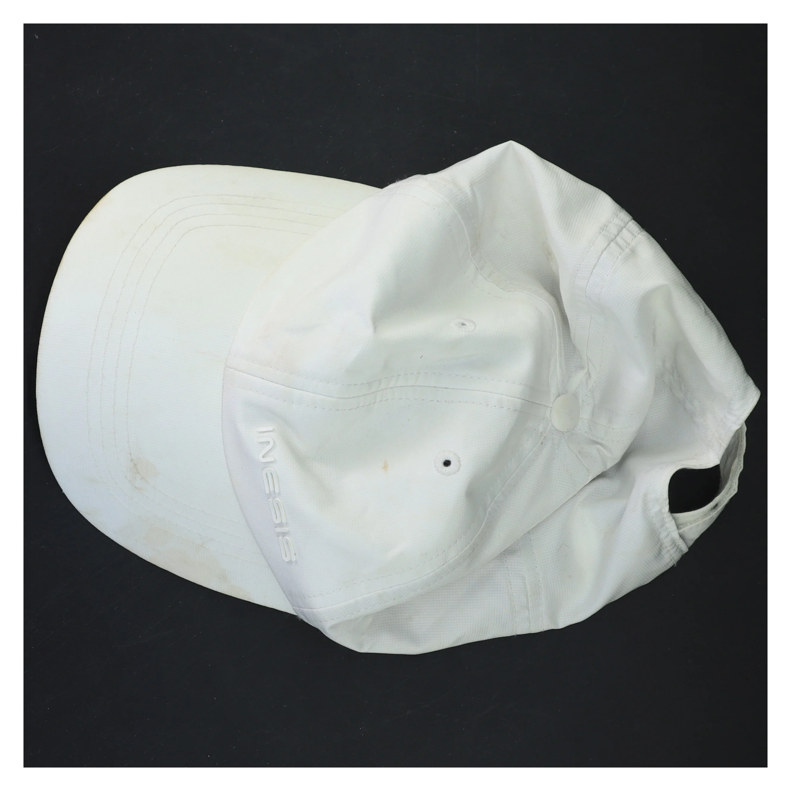 Hvid kasket fra Inesis (str. Ø 20 cm)
