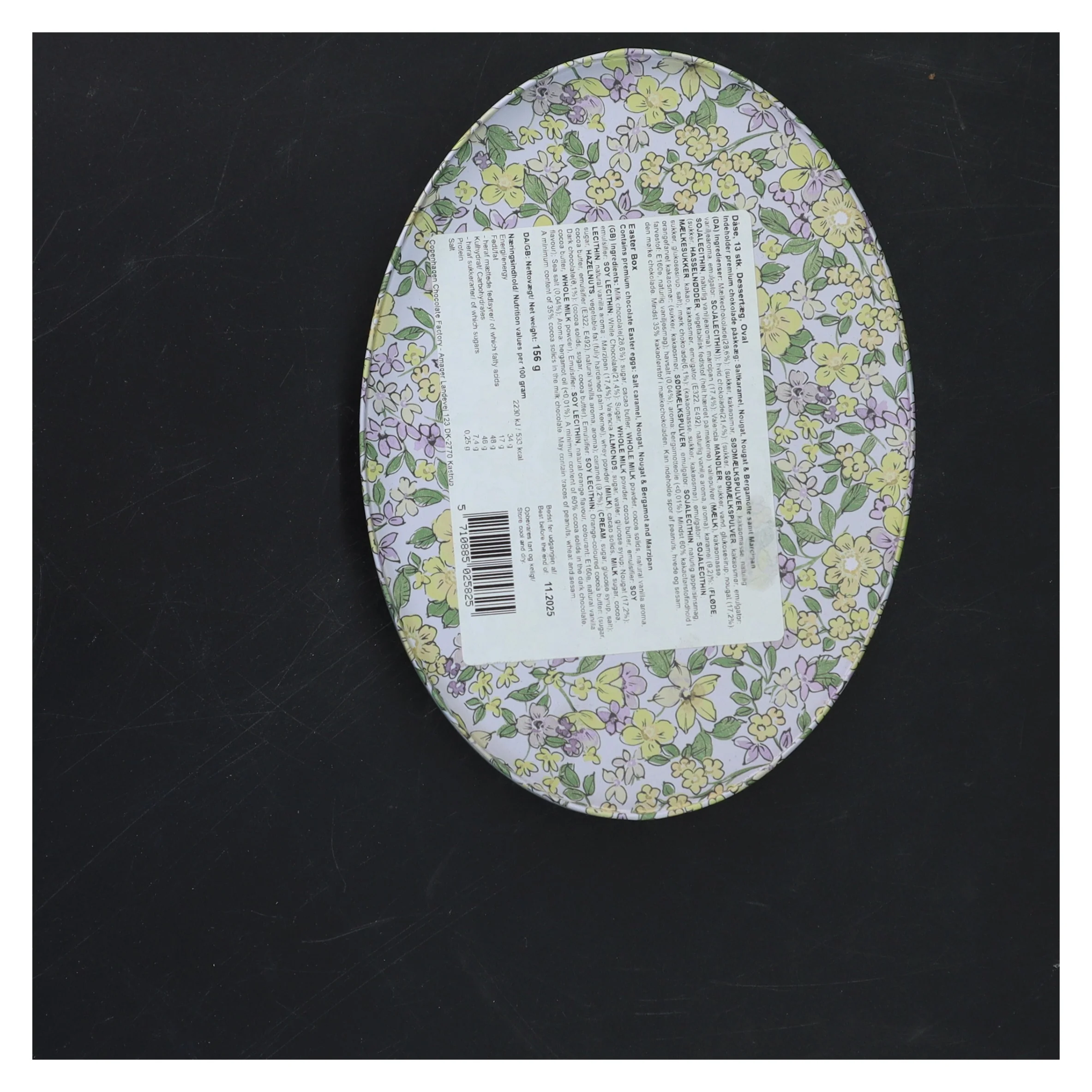 Rund metal æske med blomsterprint fra Magasin du Nord (str. 18x13x4 cm)