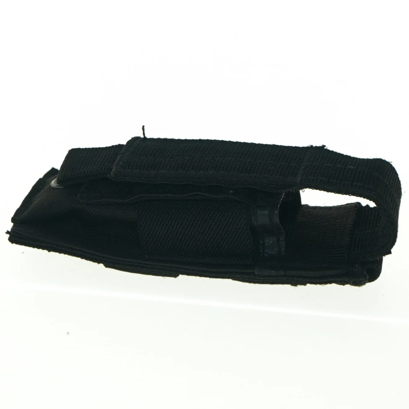 Sort holder f.eks. til telefon (str. 13 x 6 cm)