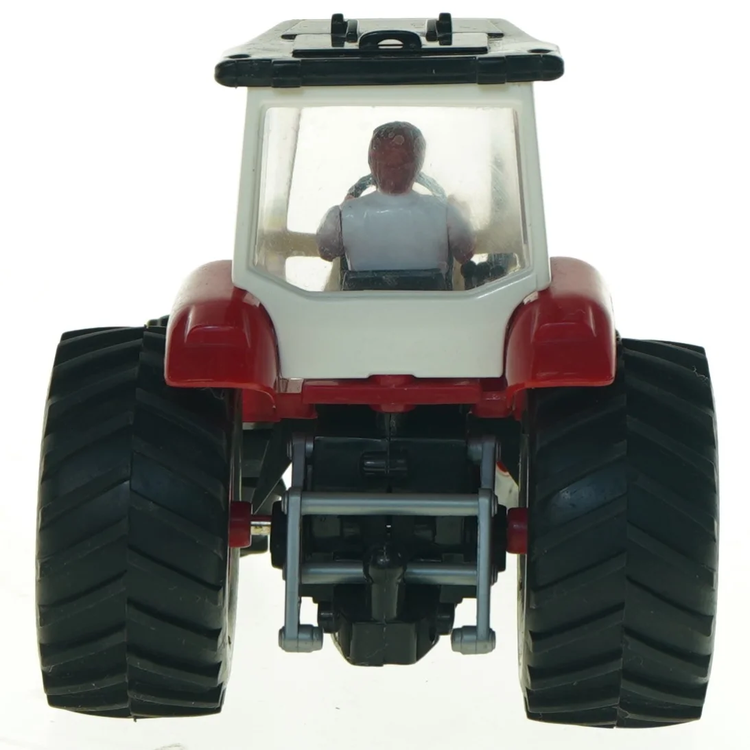 Brugt legetøjstraktor med figur (str. 20 x 11,5 cm)