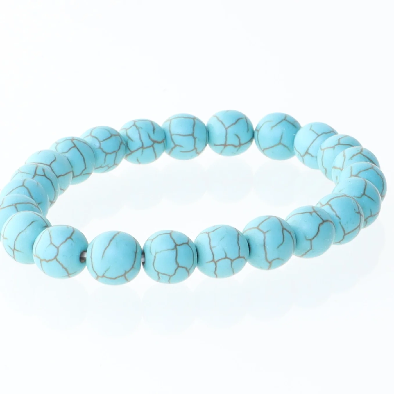 Armbånd med blå perler (str. Ø 7 cm)