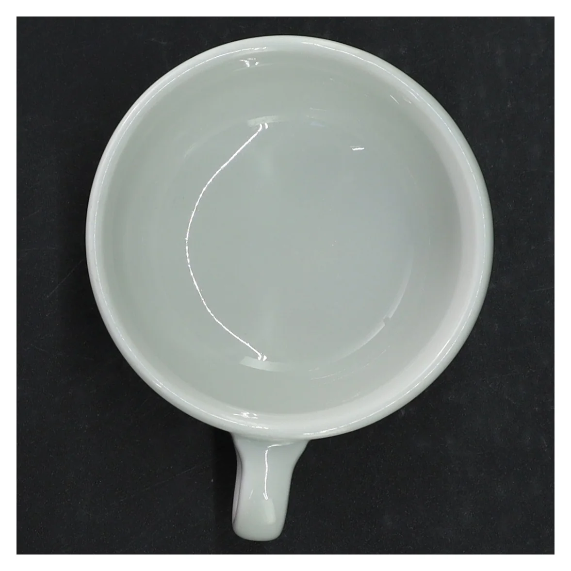 Hvid porcelænskop med underkop fra Suisse Langenthal (str. Ø. 9 cm. h. 5,5 cm)