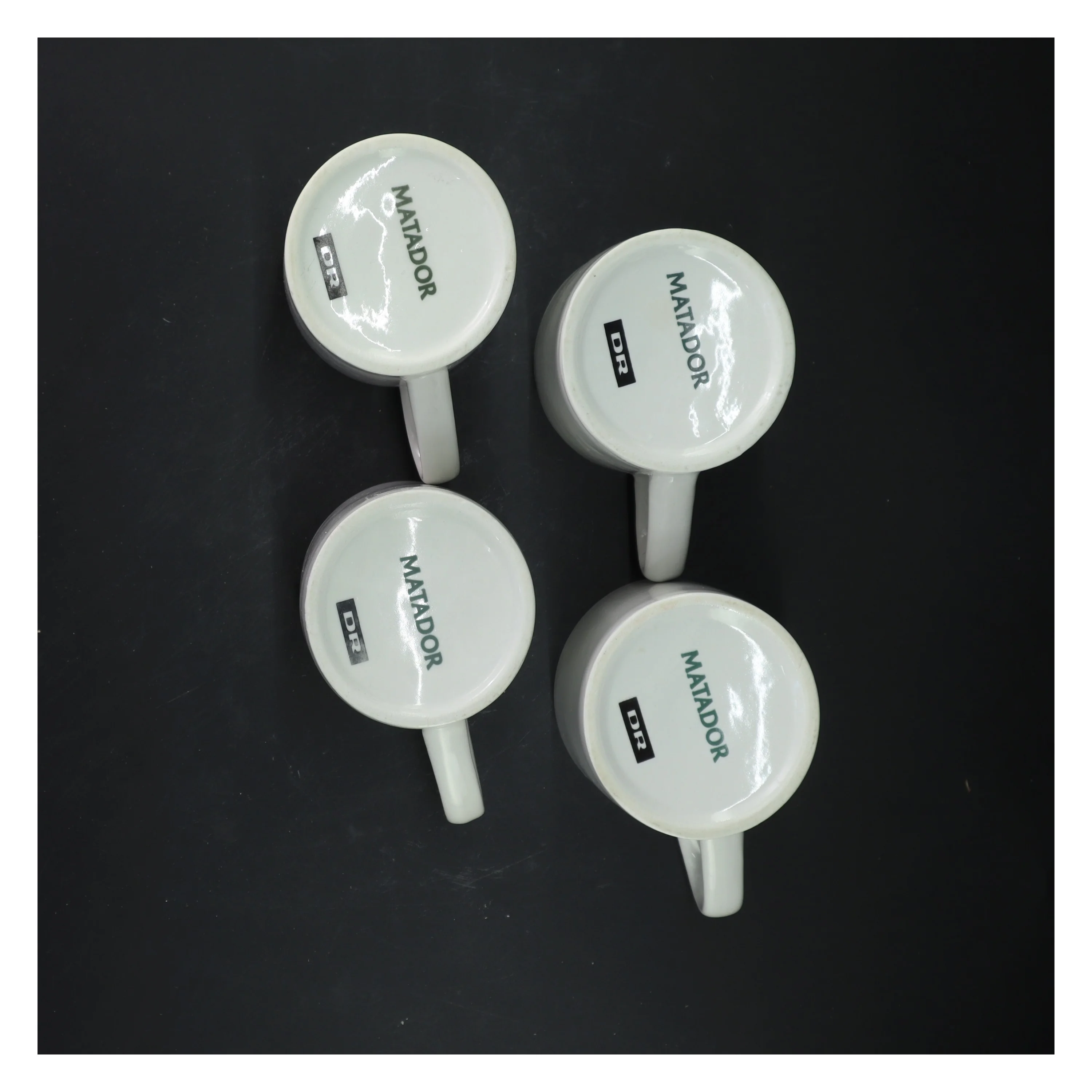 Porcelænskrus med tekst fra Matador (str. Ø 8x9 cm)