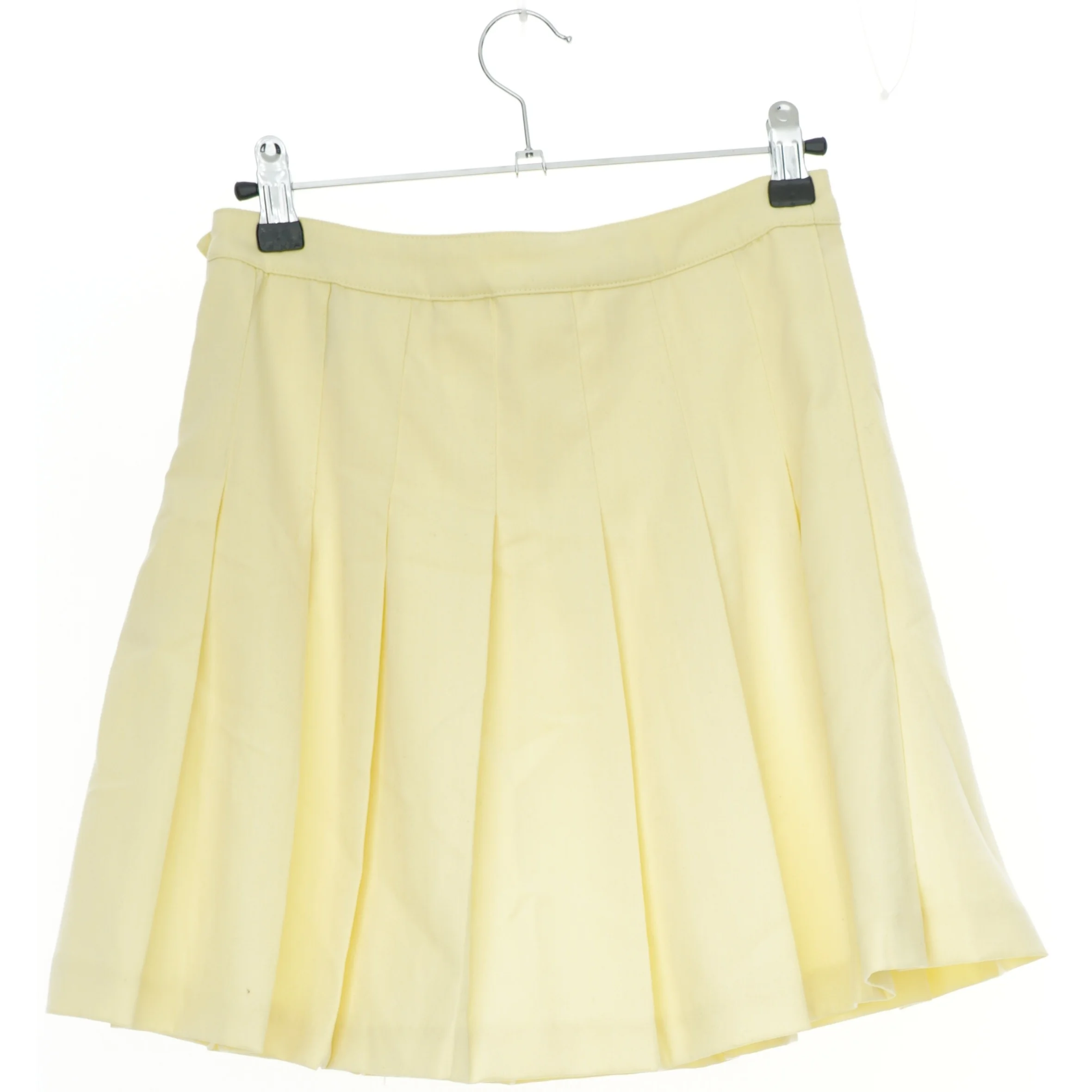 Gul plisseret nederdel fra H&M (str. 158)