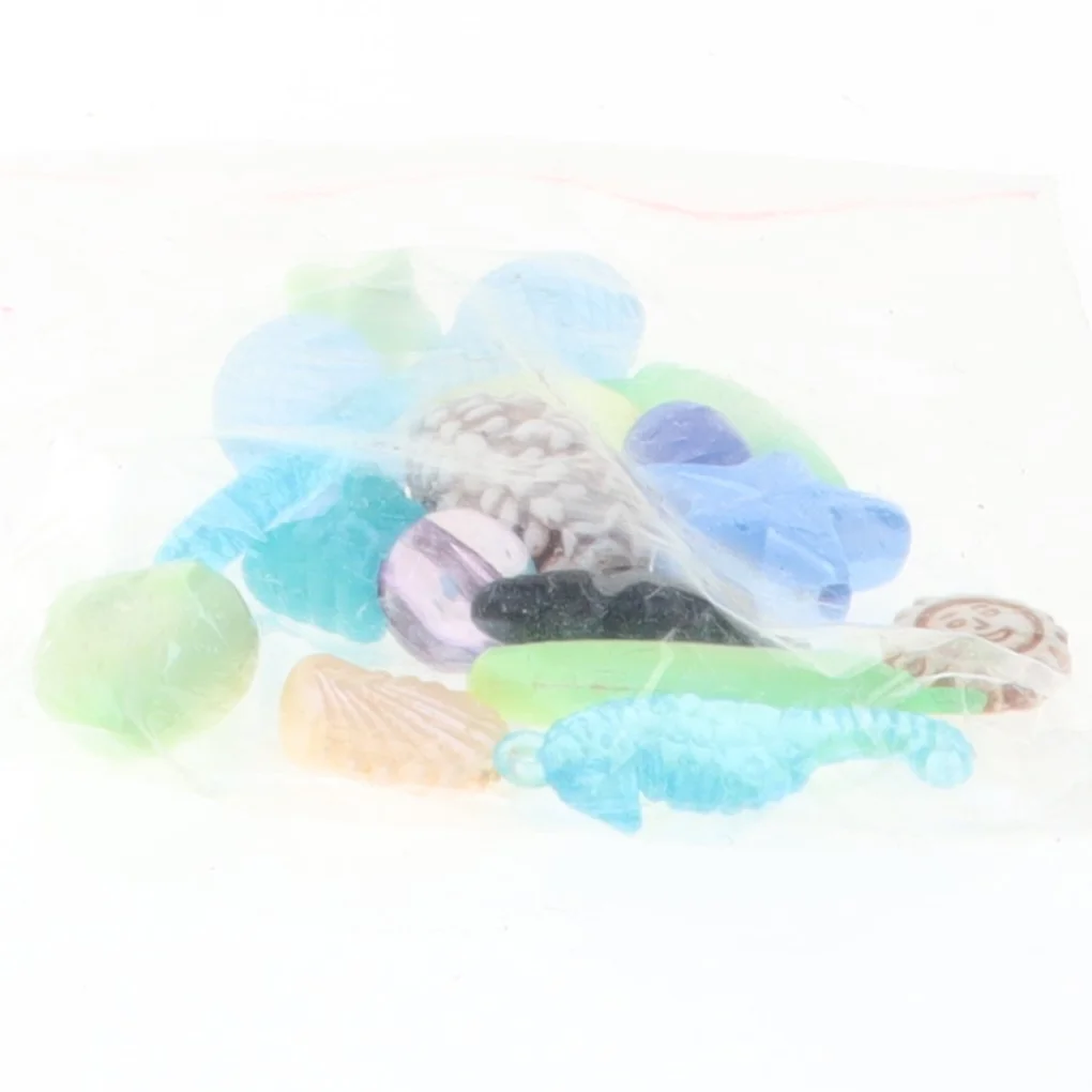 Pose med blandede smykkevedhæng (str. Posen 8 x 4 cm)