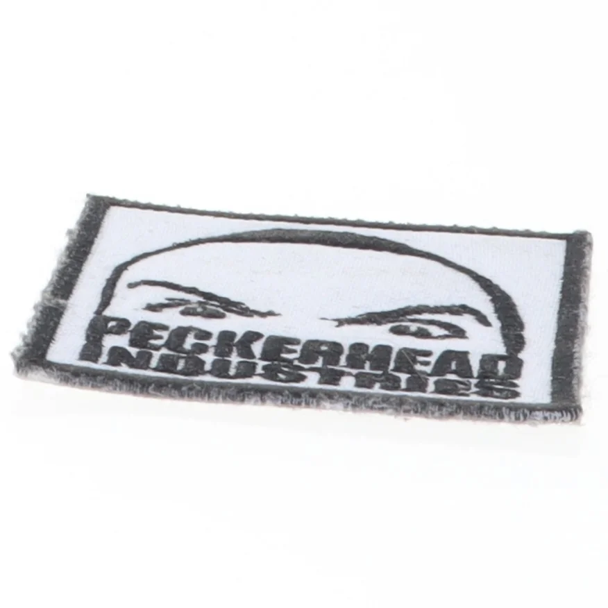 Stofmærke med logo (str. 6 x 6 cm)