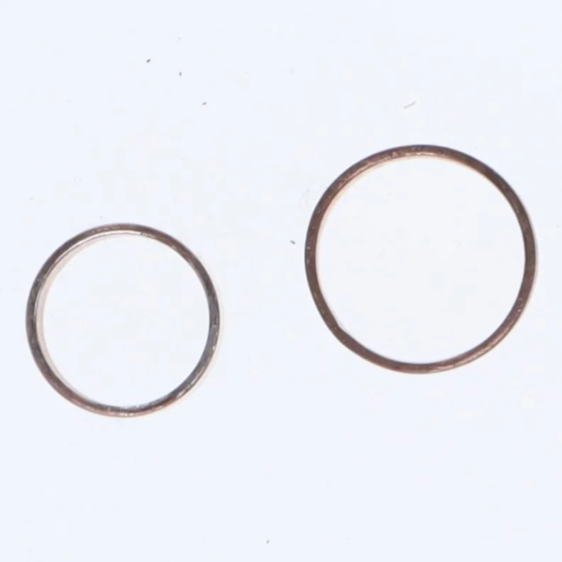 Kobberfarvede ringe (str. En komma 5 x nul komma 8 og en komma 8 x nul komma 7 sådan cm)