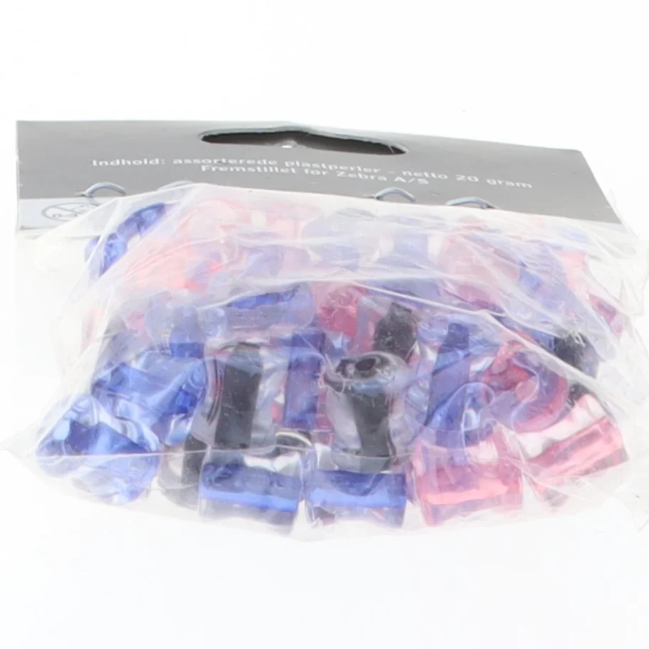 Assorterede plastperler fra Tiger (str. Pose 6 x 5 cm)