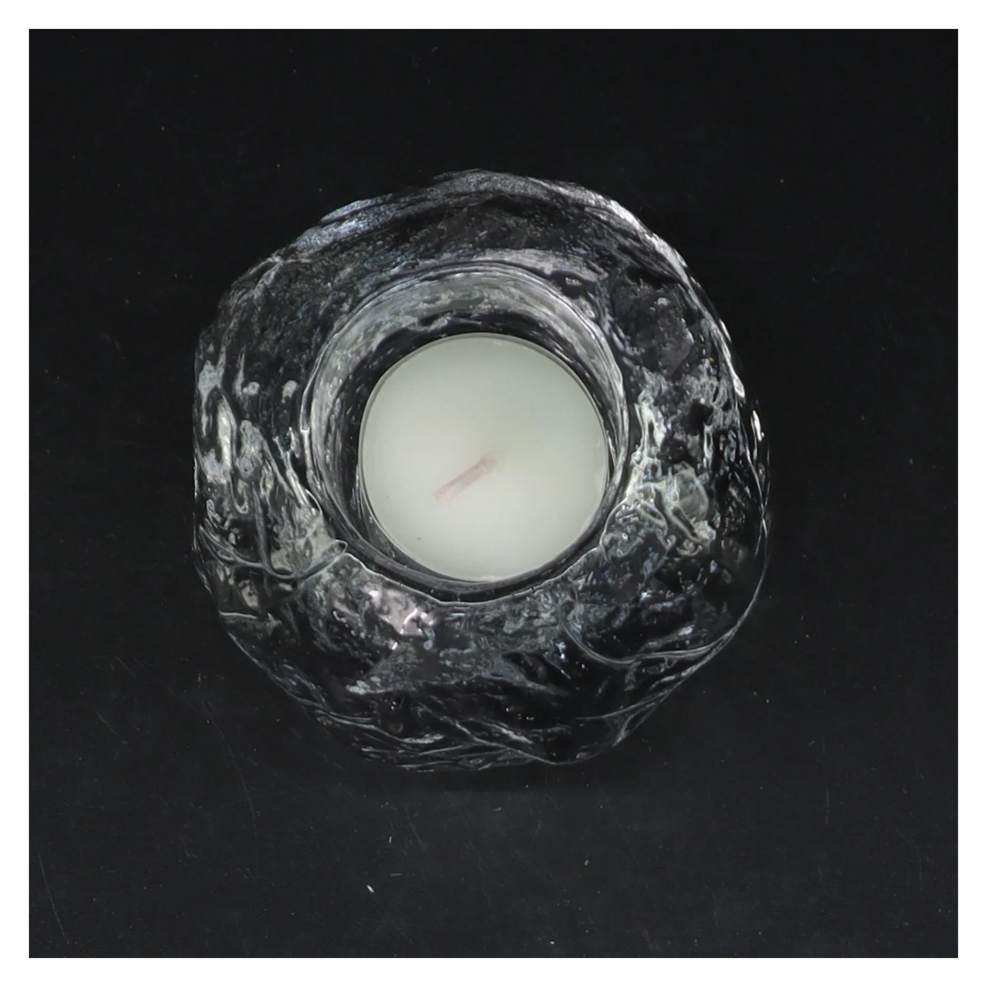 Stjerneformet lysstage i glas fra Holmegaard (str. 8 cm)