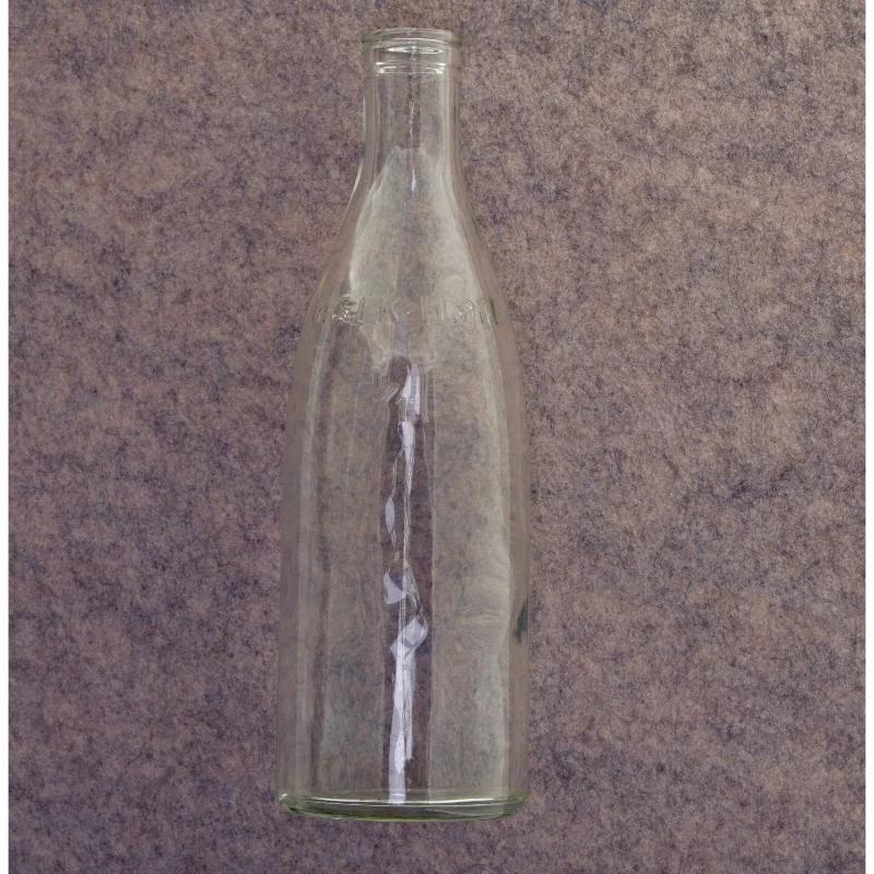 Gammel mælkeflaske (str. 28 x 9 cm)