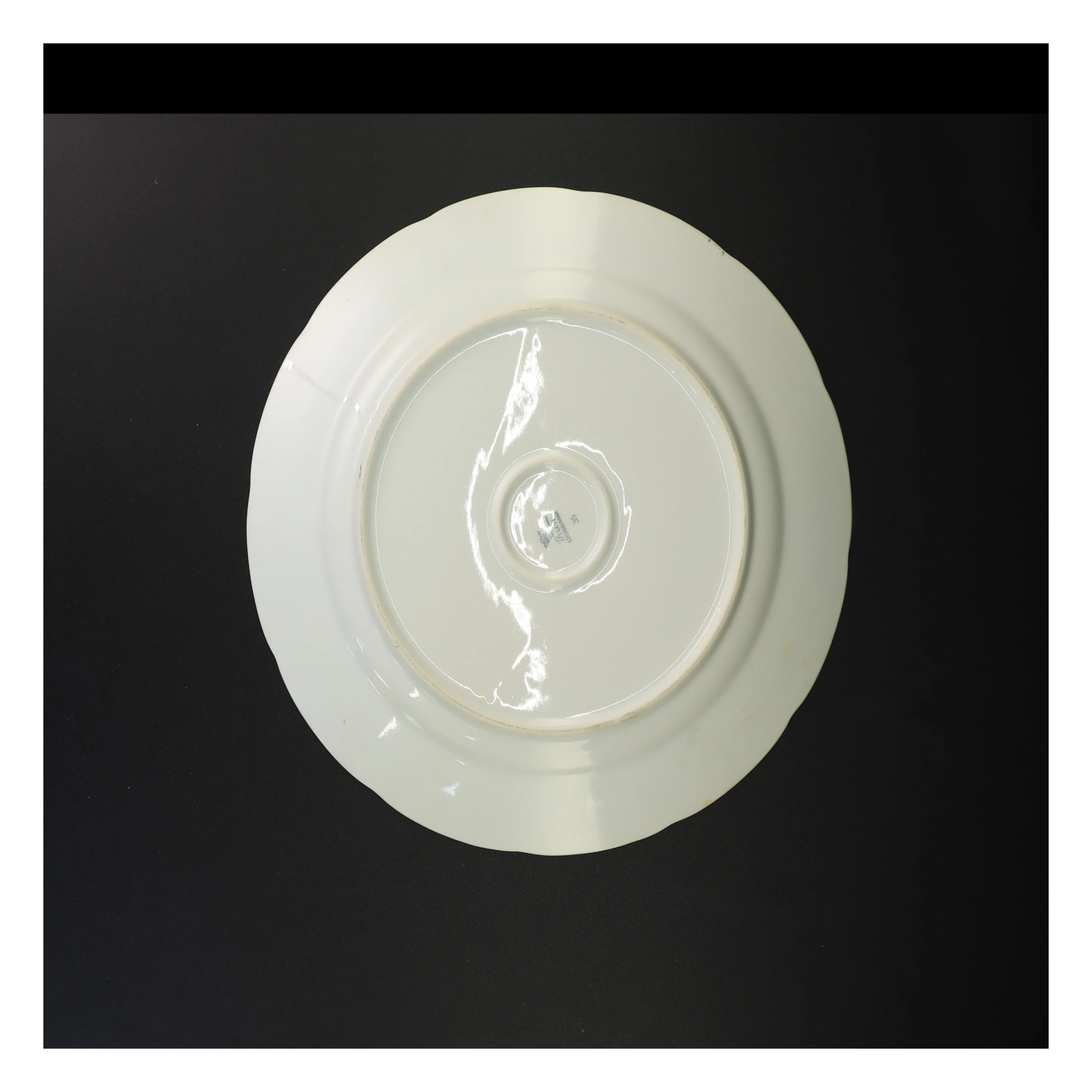 Dekorativ porcelænstallerken (str. 31 cm)