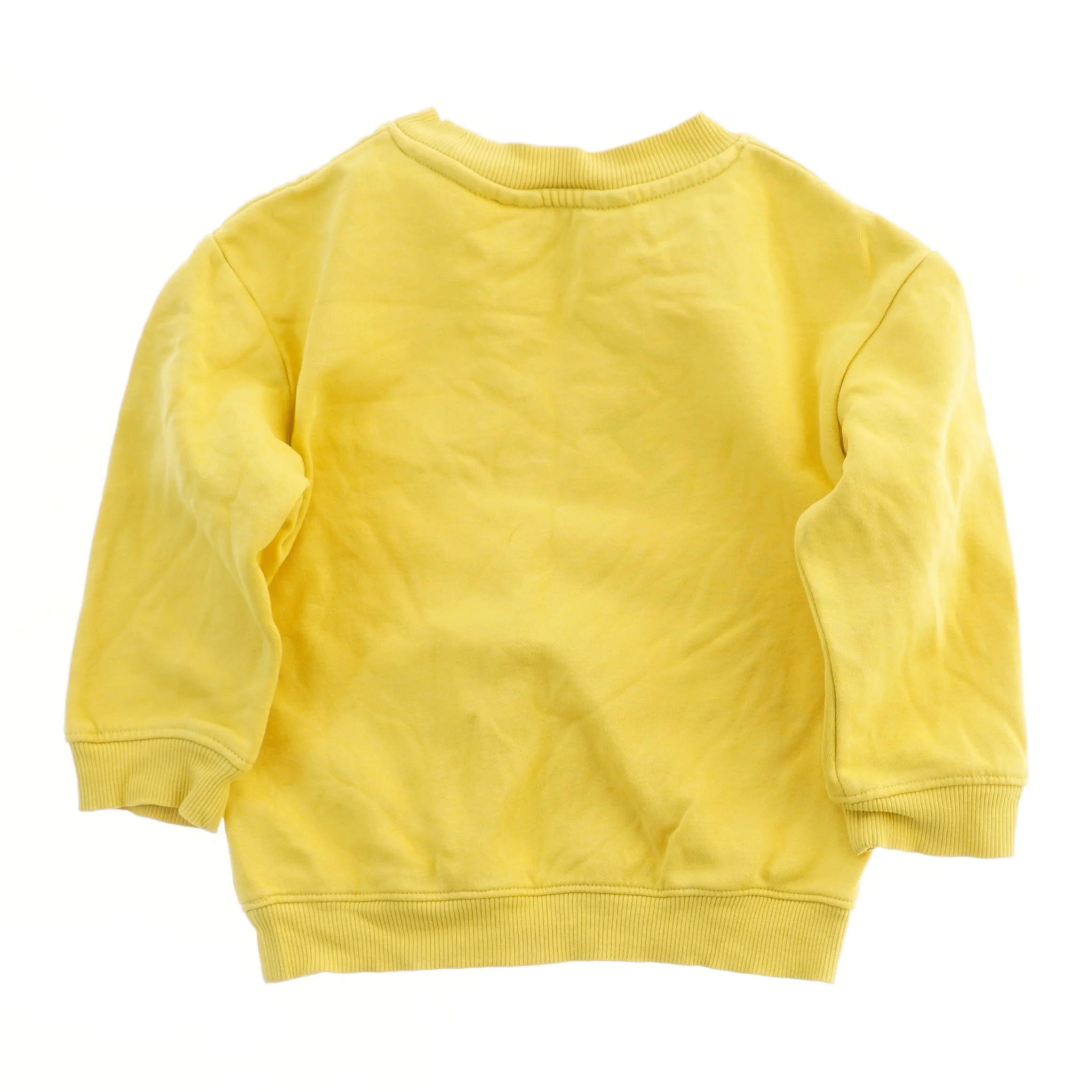 Gul sweatshirt med tryk fra H&M (str. 92)