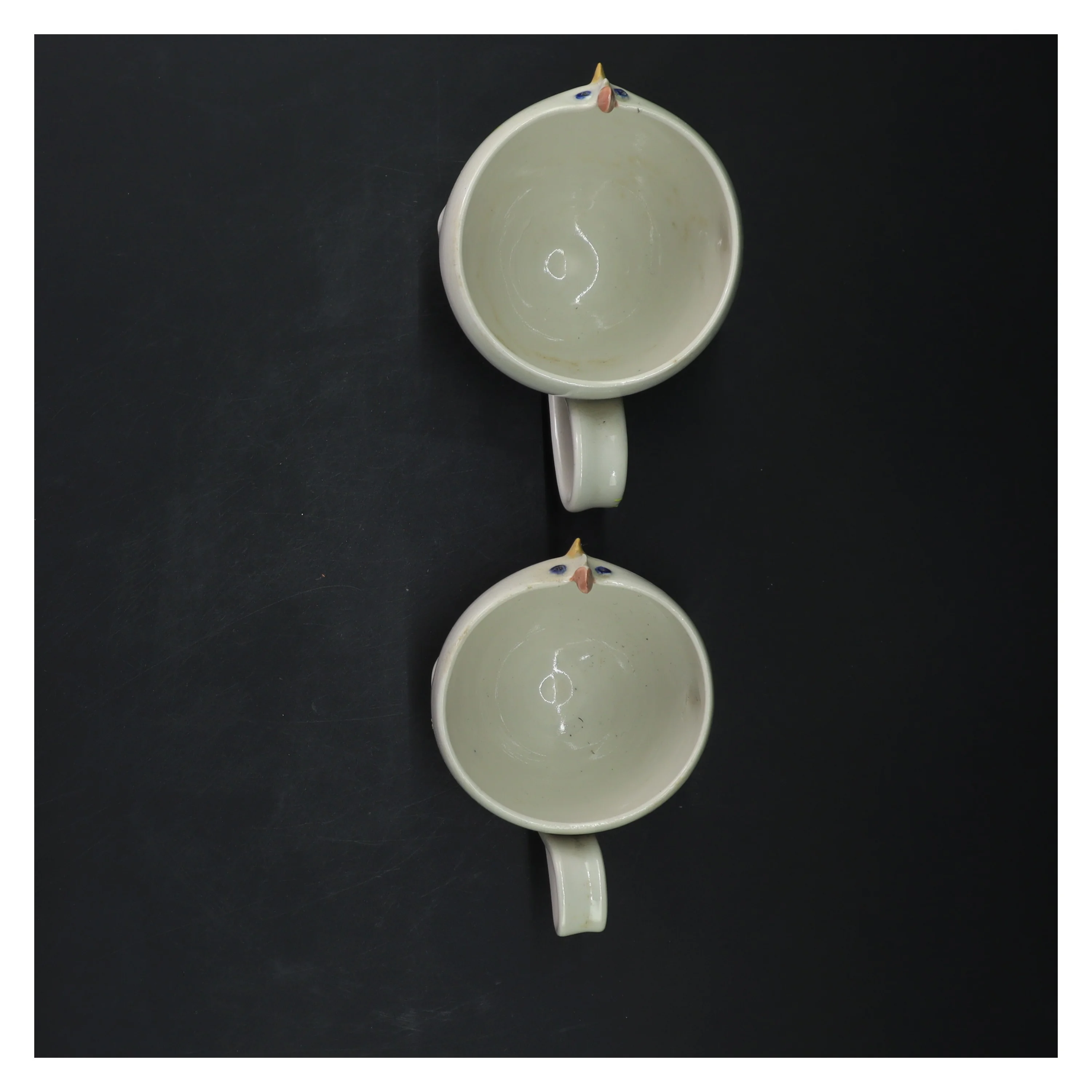 Keramik kopper med ansigt (str. 8 og 7 cm) fra keramiker