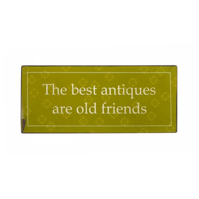 Skilt med tekst "The best antiques are old friends" (29x13 cm)