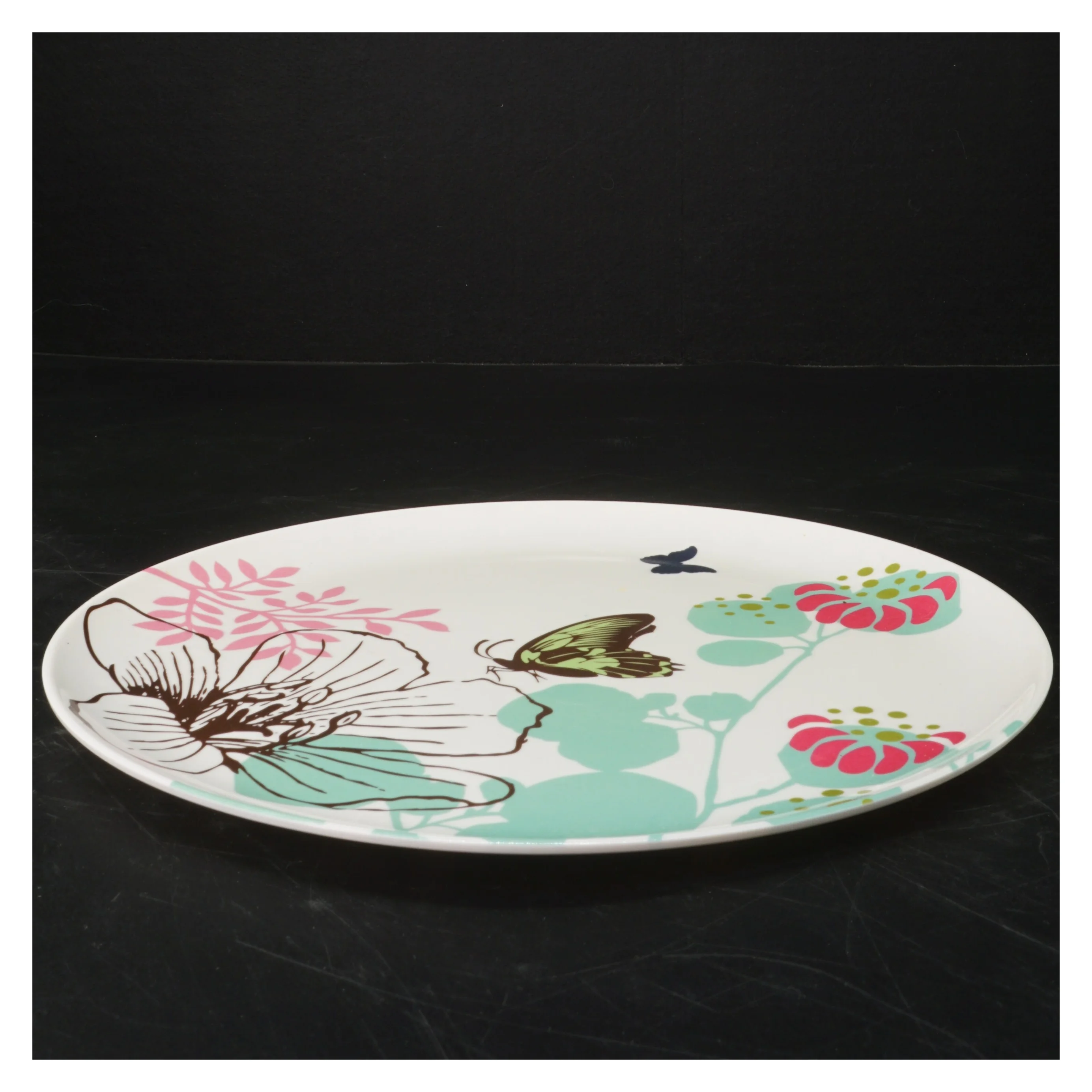 Sæt med 4 dekorerede tallerkener (str. Ø. 28 cm. 4 styk)