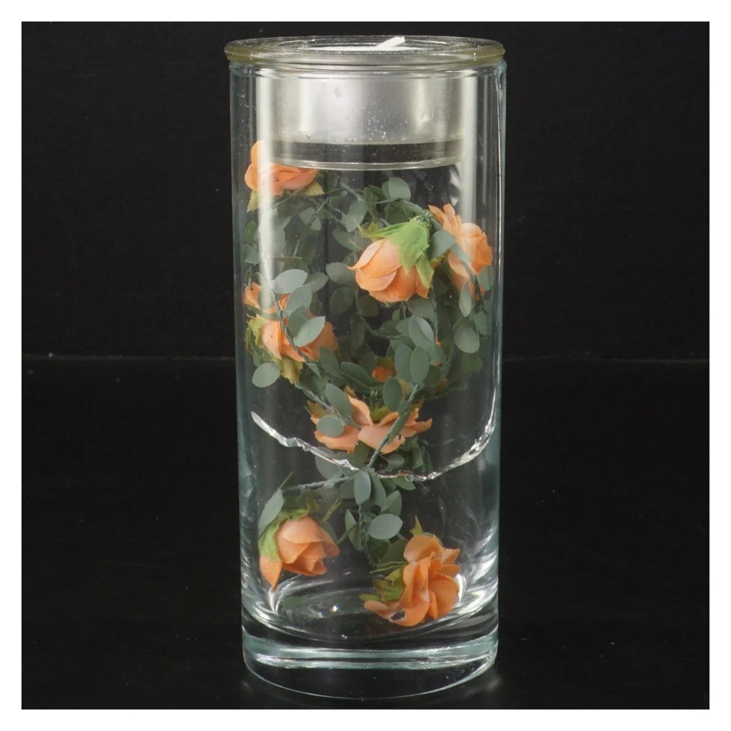 Glasvase med kunstige blomster og fyrfadslys (str. 15 cm)