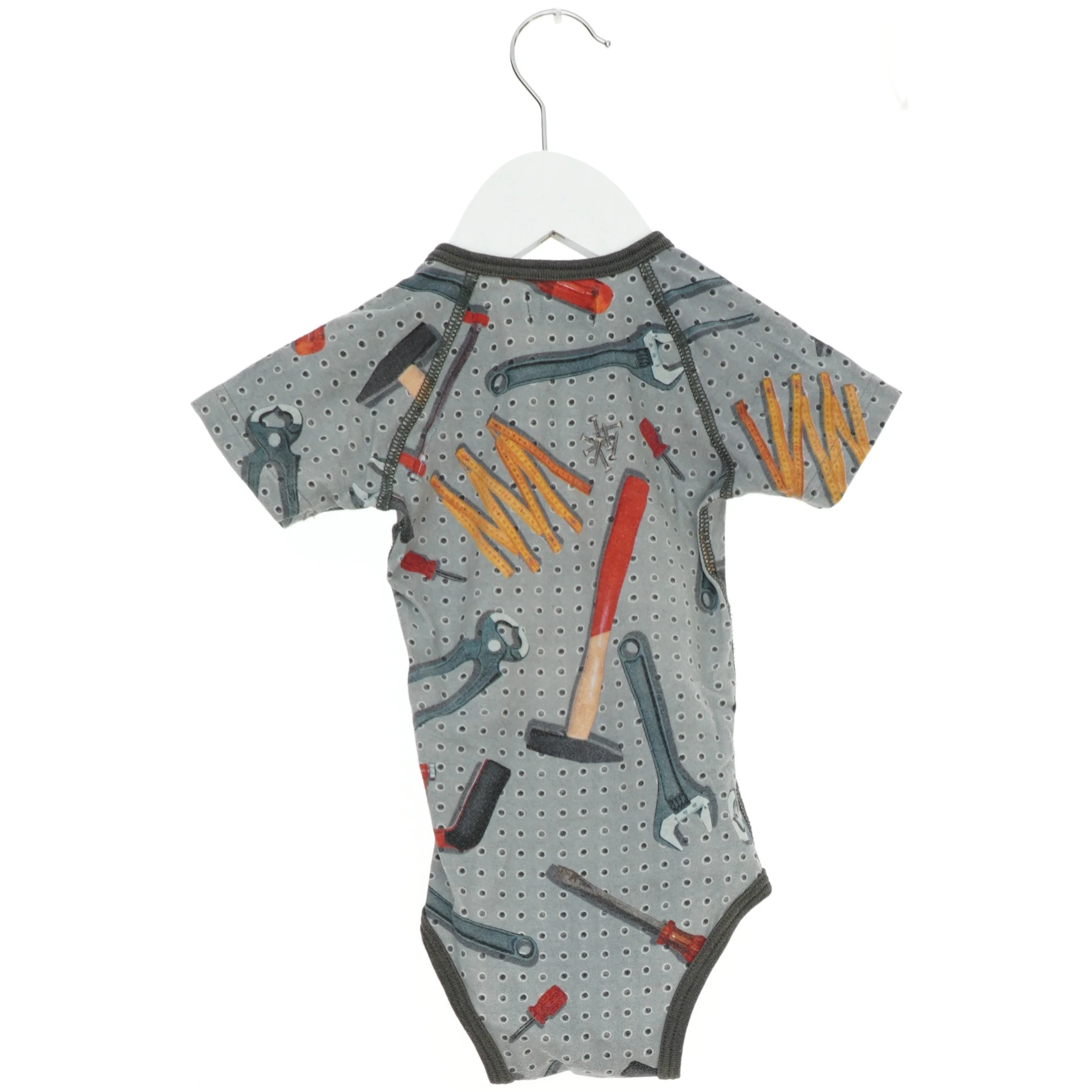 Grå bodystocking med værktøjsprint fra Molo (str. 74)