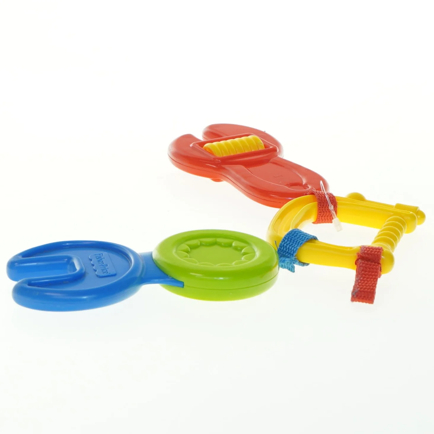 Babylegetøj i form af værktøj fra Fisher-Price (str. 12x6,5 cm)