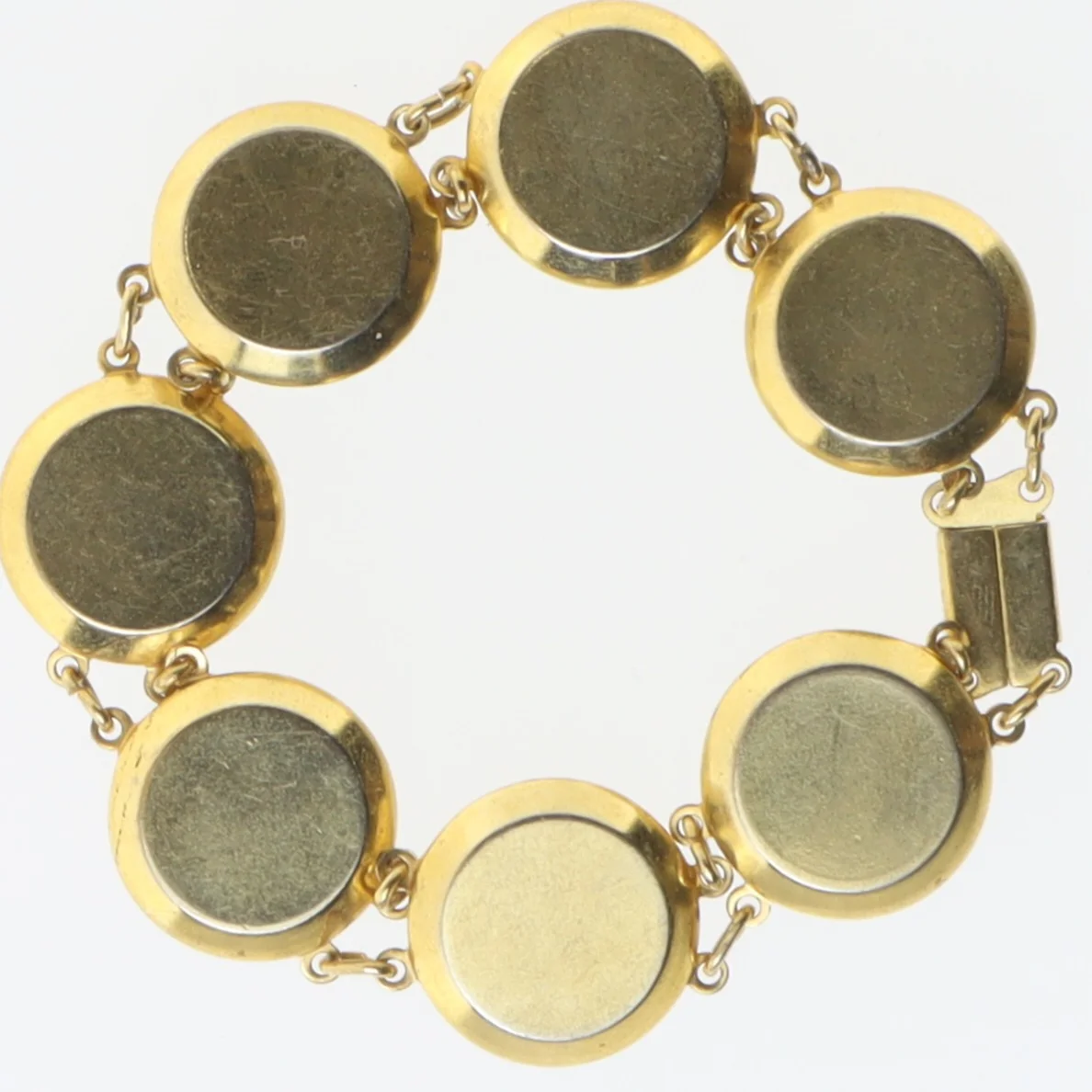 Armbånd med cirkulært design (str. Ø 7,5 cm)