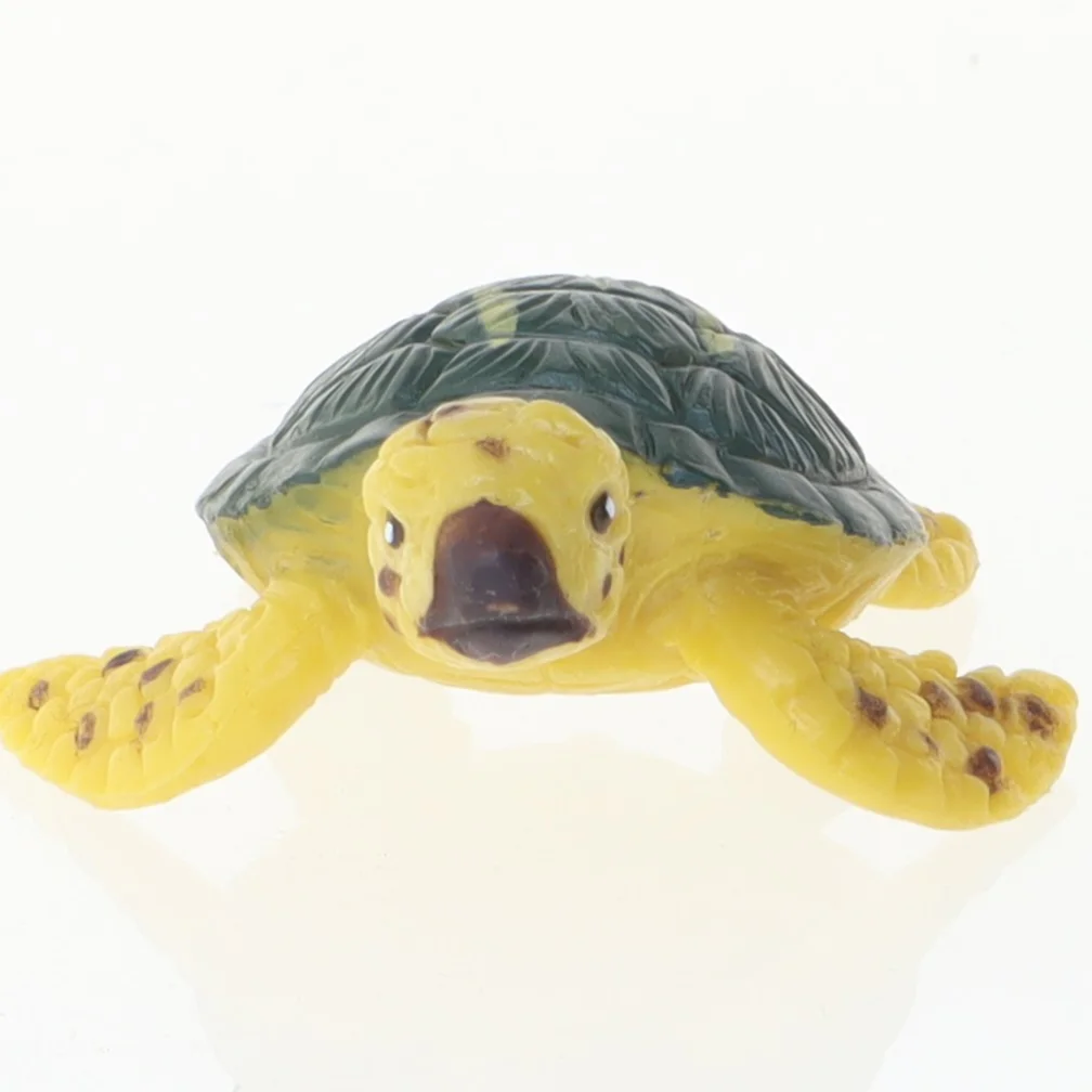 Lille havskildpaddefigur (str. 6x5 cm)