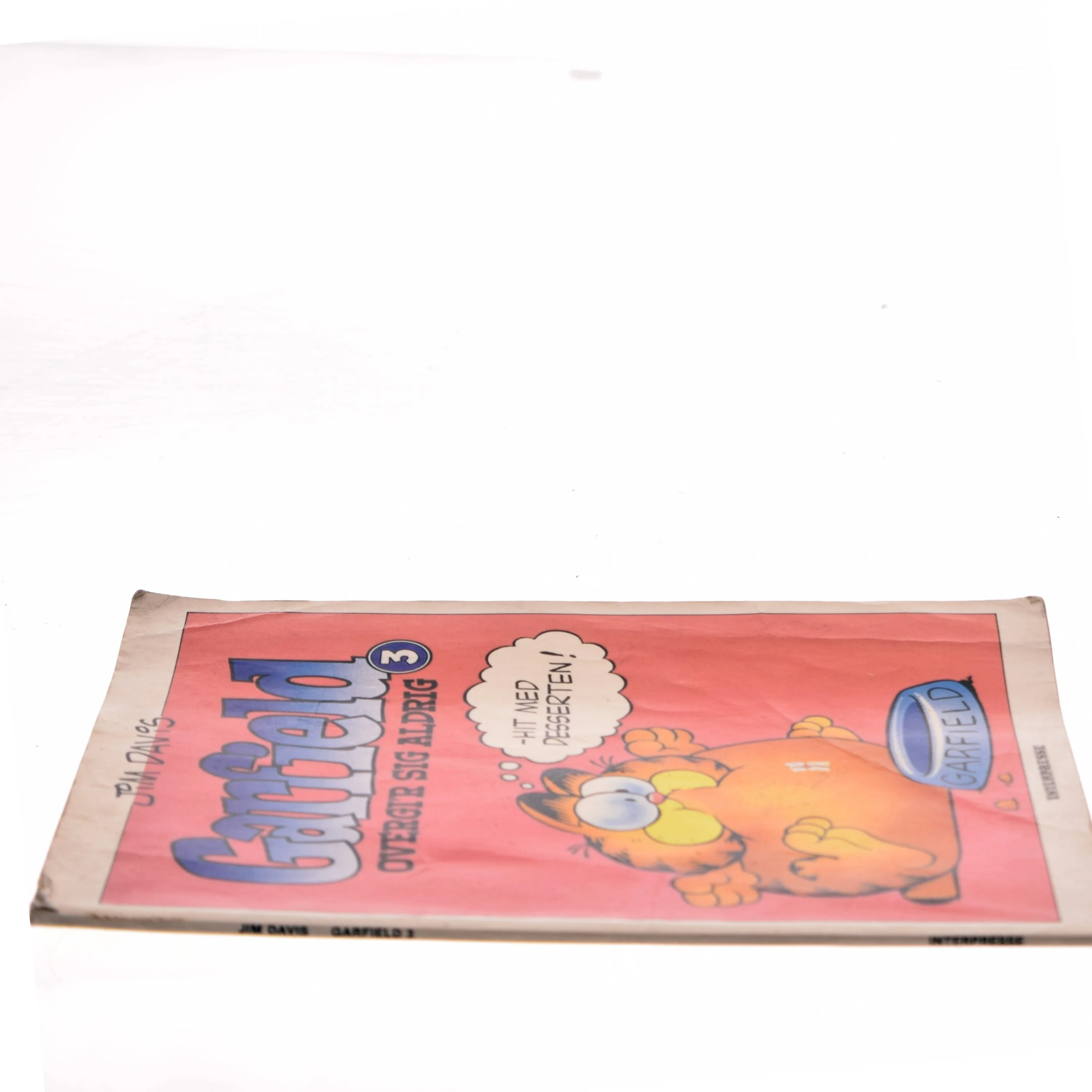 Garfield Overgi'r Sig Aldrig af Jim Davis (Bog)