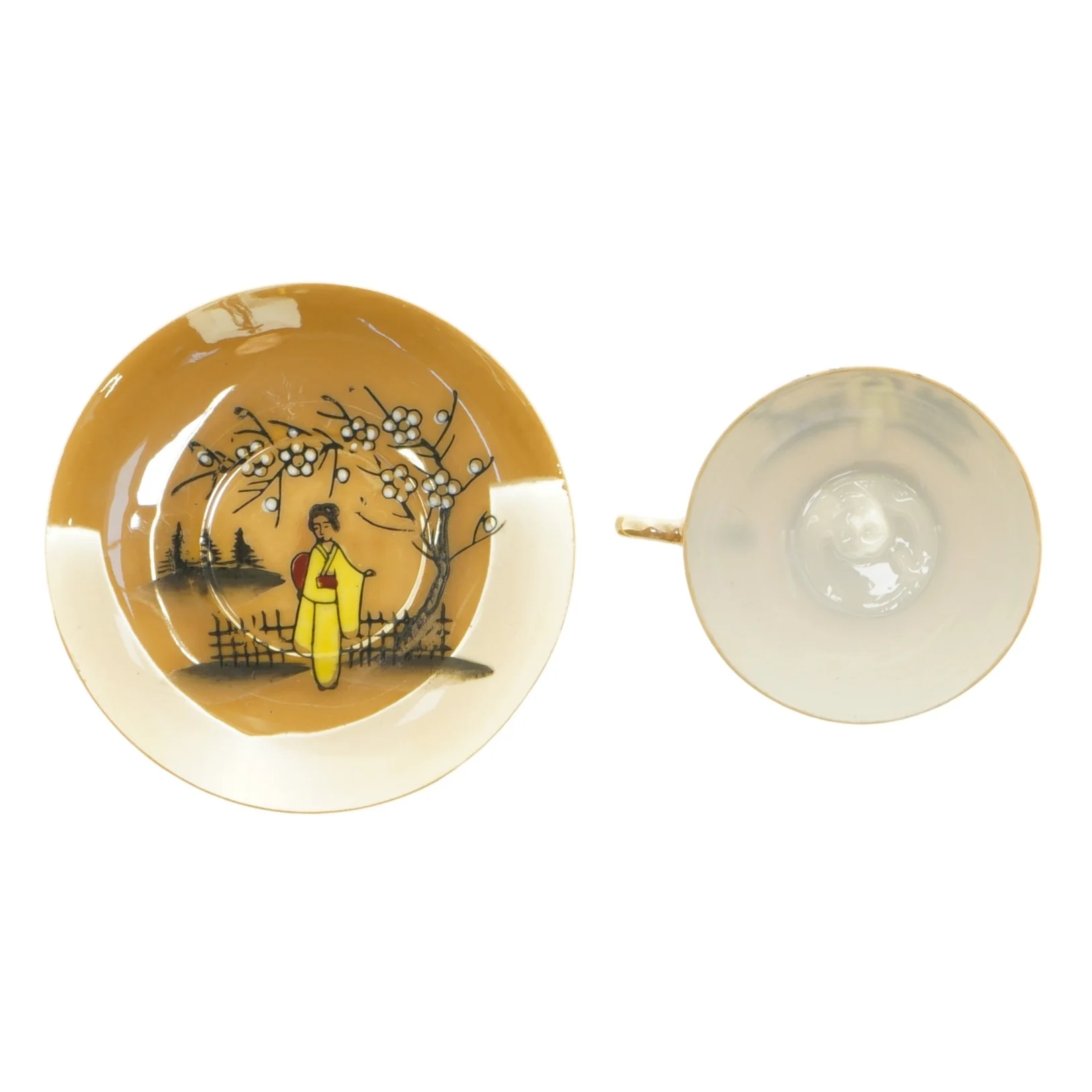 Mokkakop med ansigt i bunden 