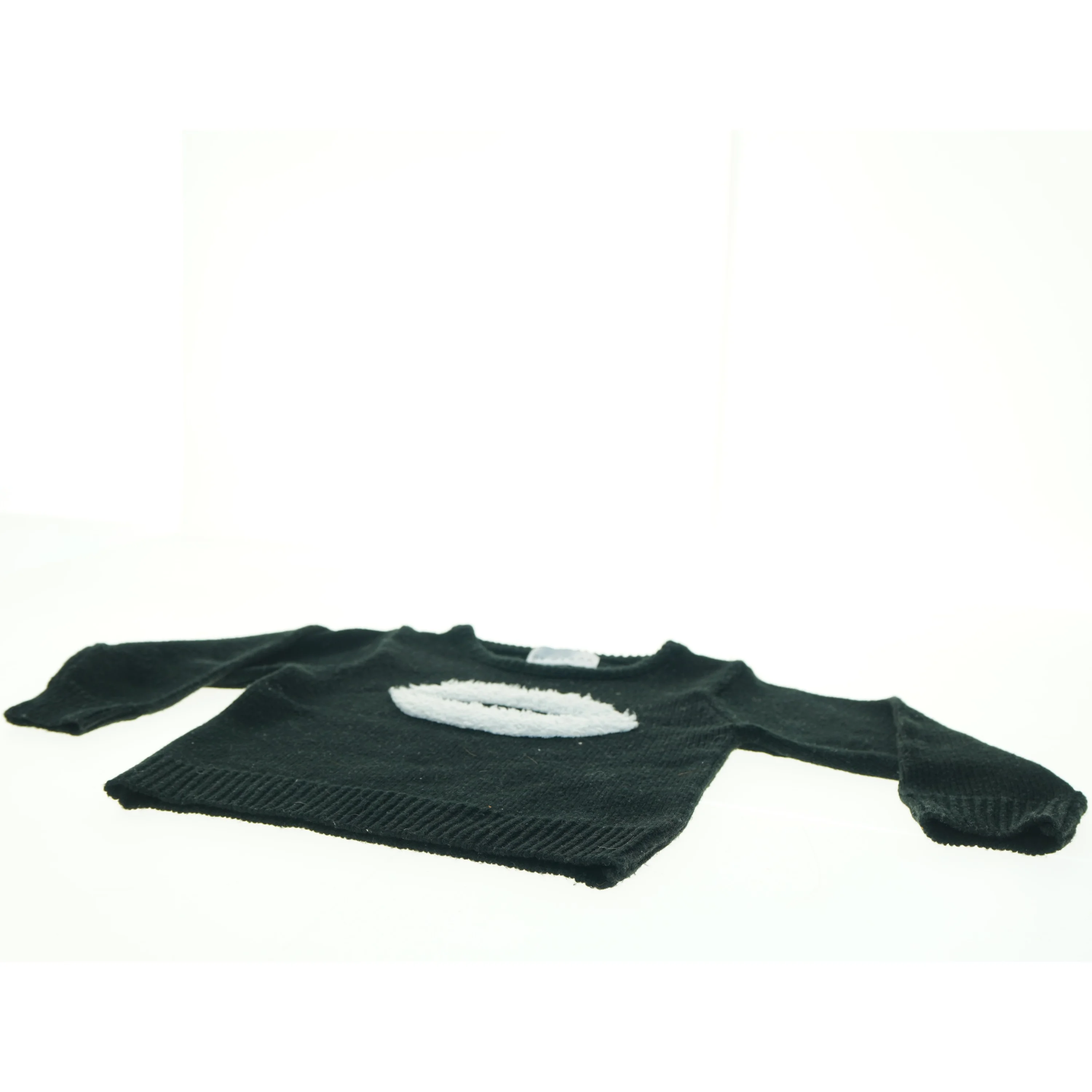 Sort strik sweater med mønster fra By Clara (str. 36 x, 30 cm ærme, 24,5 cm)