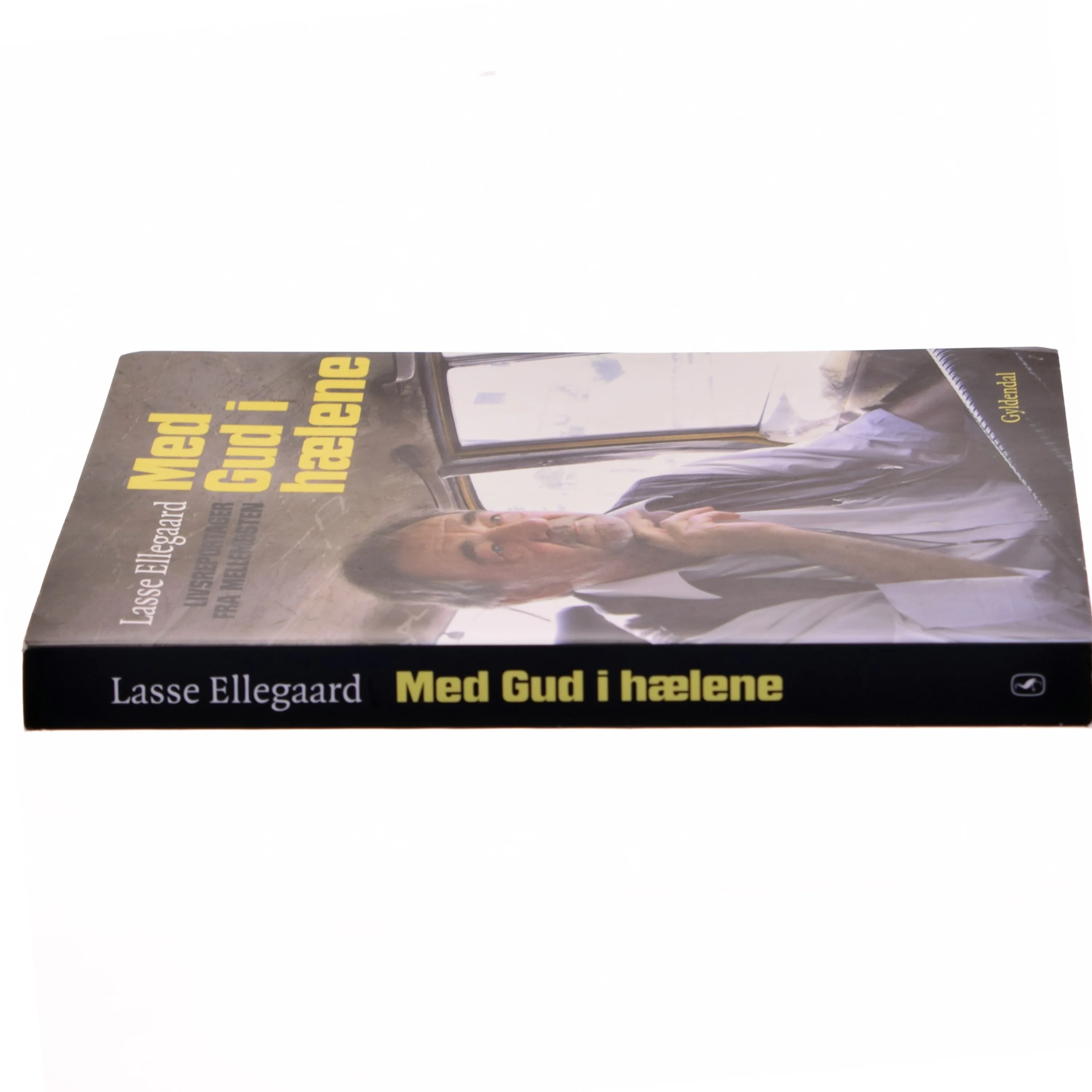 Med Gud i hælene : livsreportager fra Mellemøsten af Lasse Ellegaard (Bog)