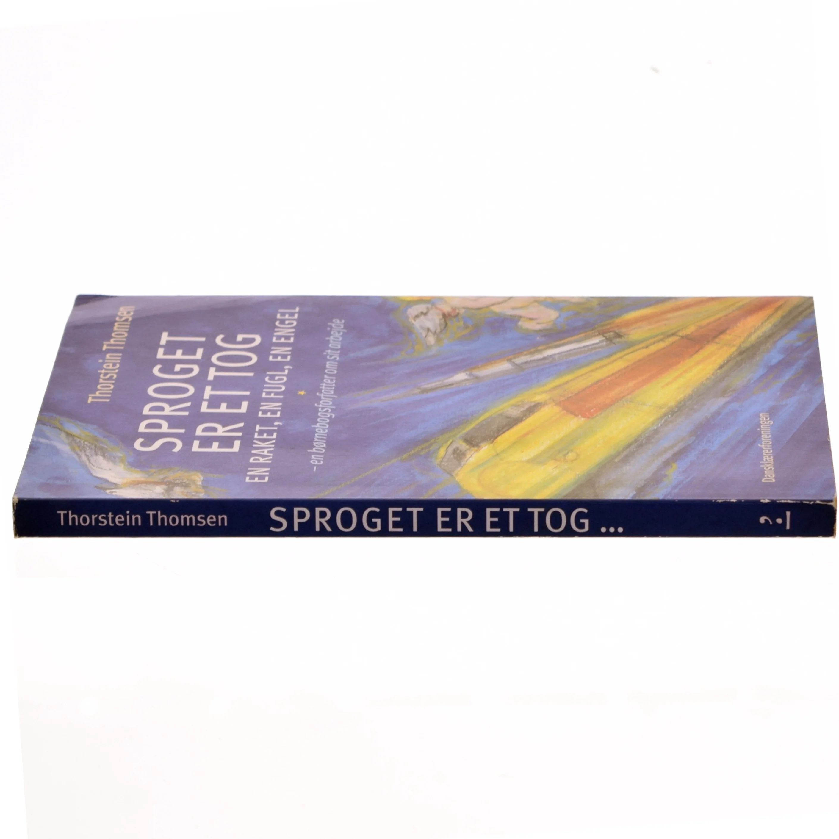 Sproget er et tog, en raket, en fugl, en engel : en børnebogsforfatter om sit arbejde af Thorstein Thomsen (f. 1950) (Bog)