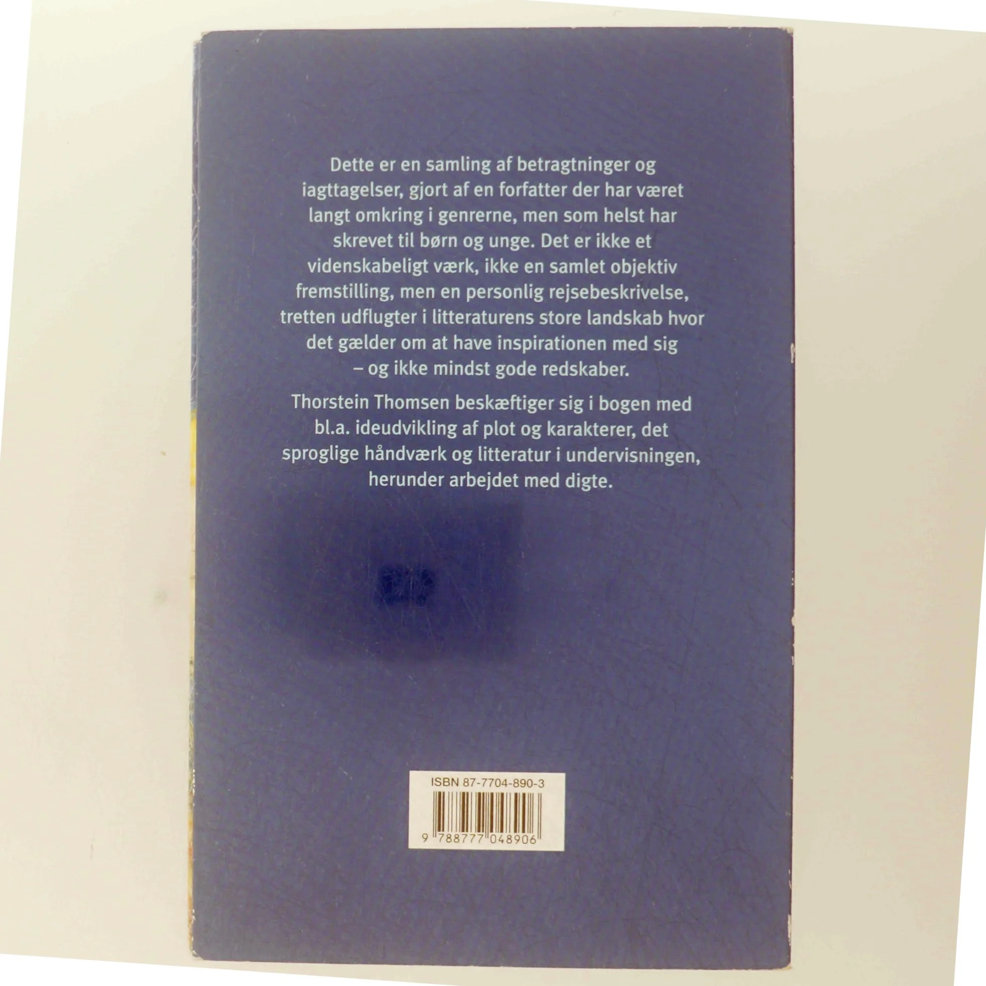 Sproget er et tog, en raket, en fugl, en engel : en børnebogsforfatter om sit arbejde af Thorstein Thomsen (f. 1950) (Bog)