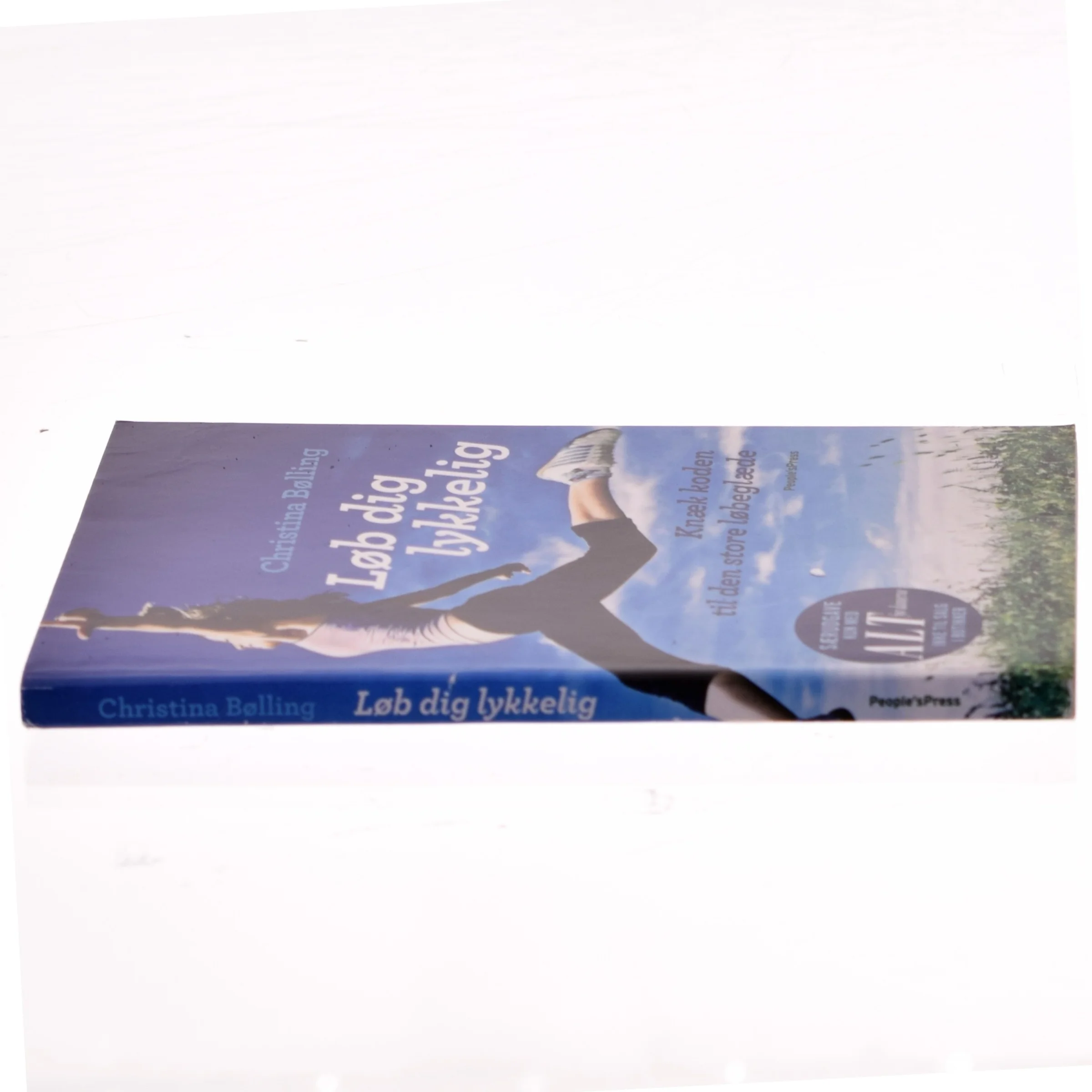 Løb dig lykkelig : knæk koden til den store løbeglæde af Christina Bølling (Bog)