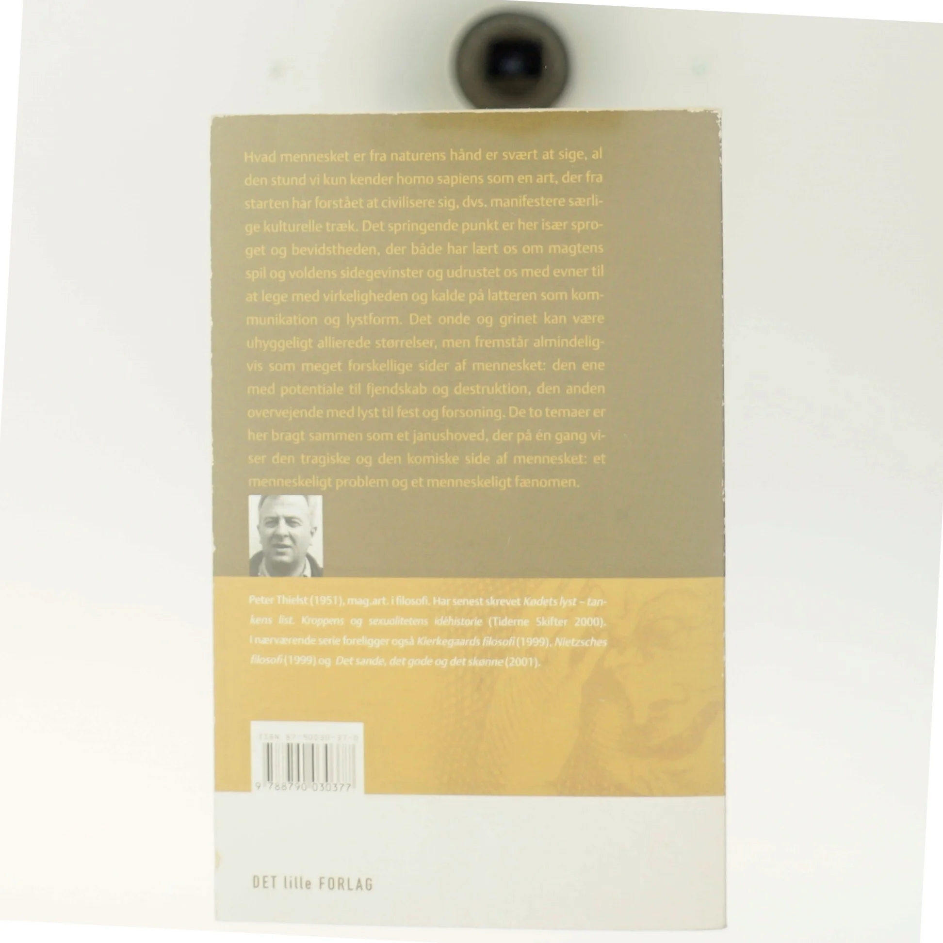 Det onde & Latterens lyst : to sider af mennesket, to idéhistoriske indføringer af Peter Thielst (Bog)