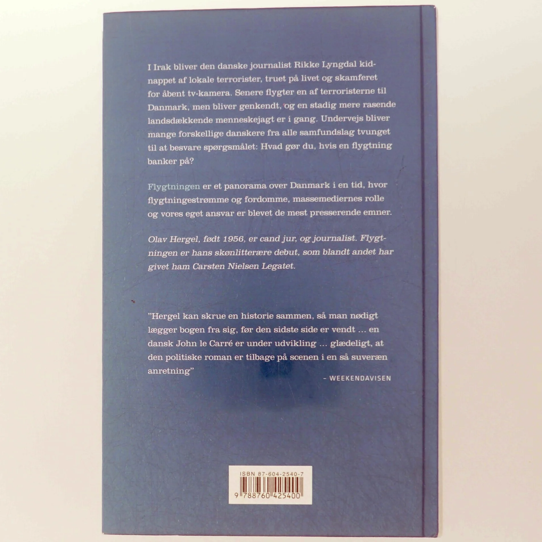 Flygtningen : roman af Olav Hergel (Bog)