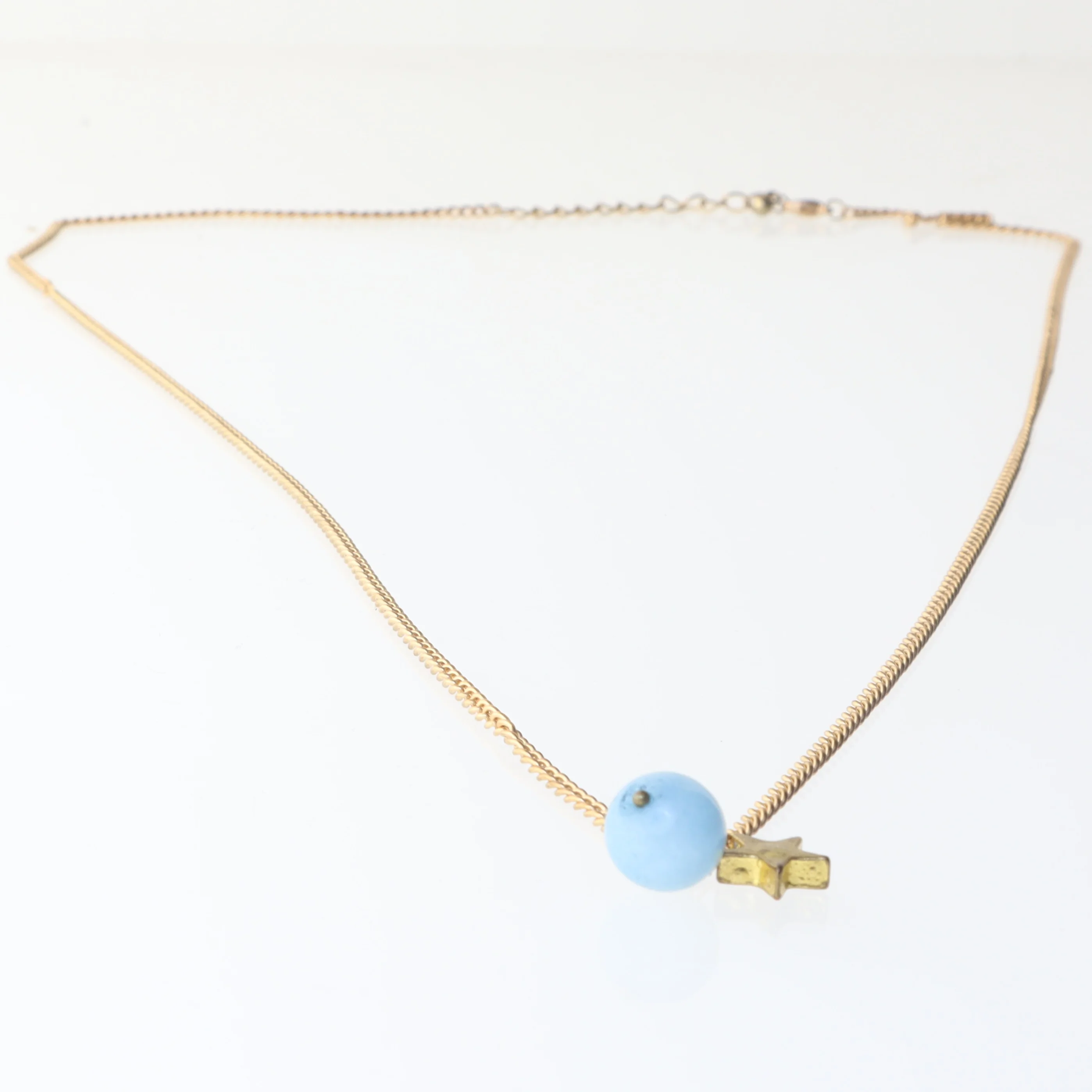 Guld halskæde med blå perle og stjerne (str. 86 cm)