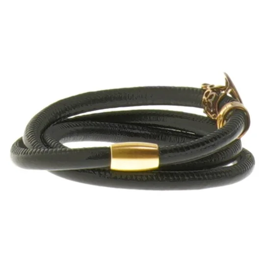 Sort læderarmbånd med guld detaljer fra Christina Watches (str. Ø 5,5 cm)