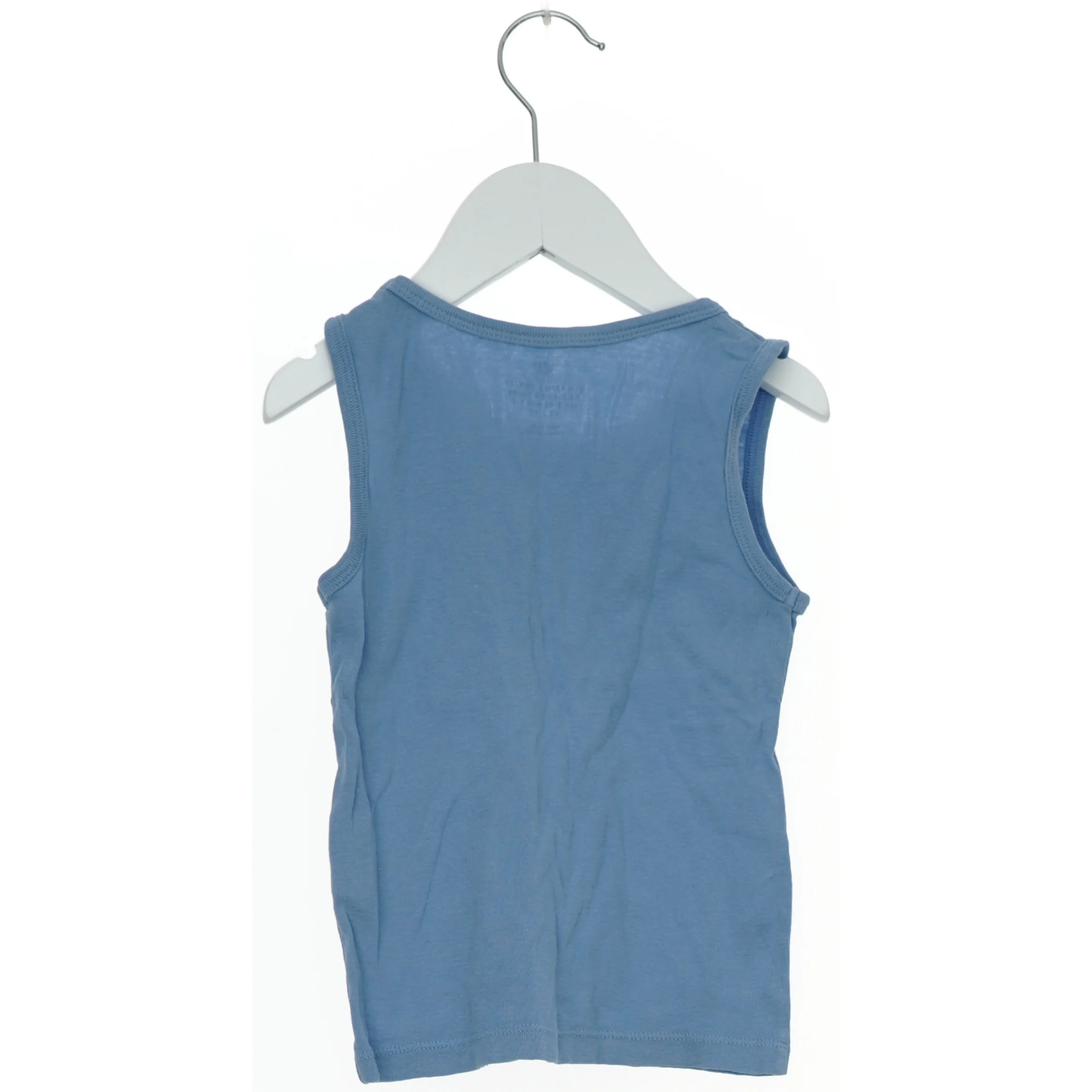 Lyseblå tanktop fra H&M (str. 104)