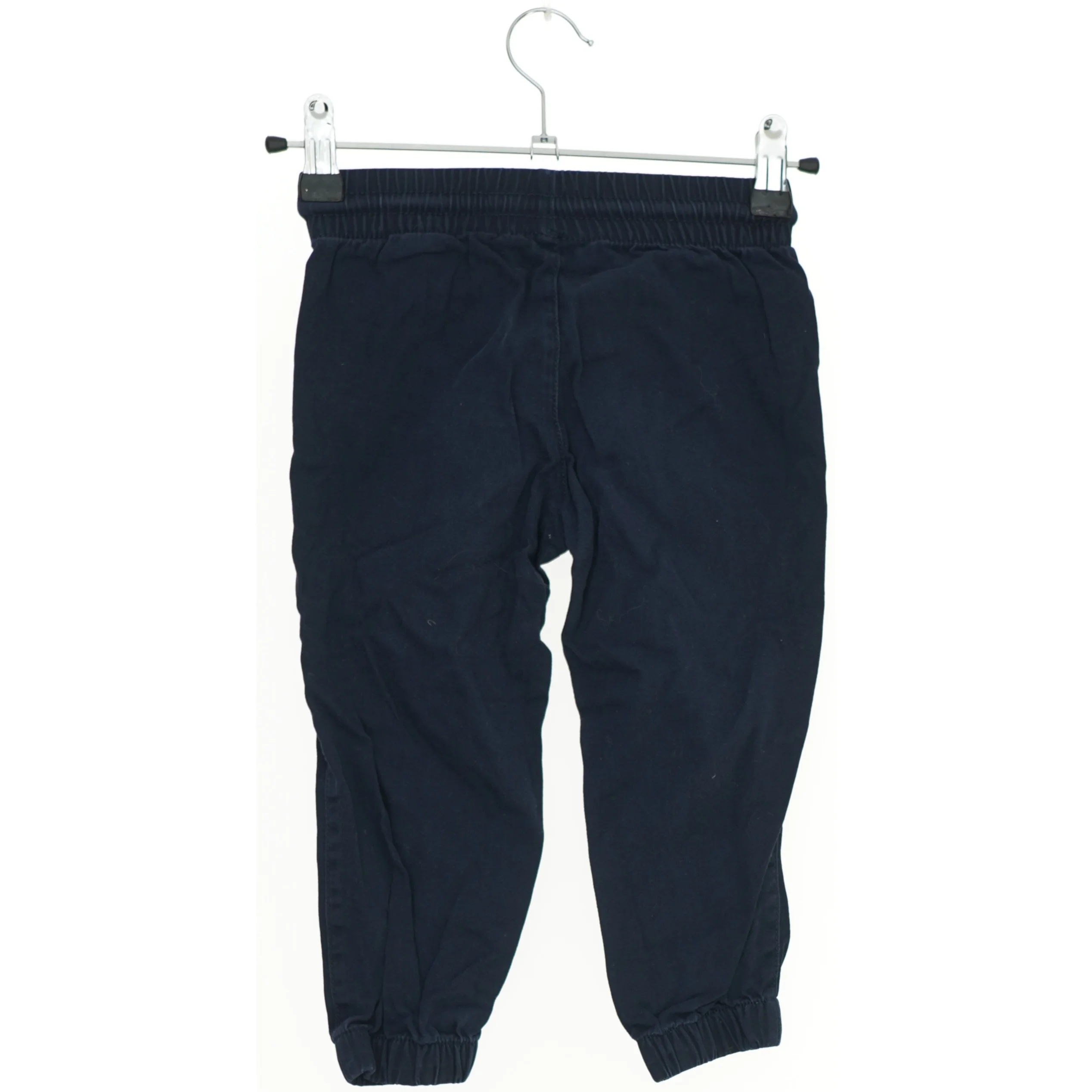 Mørkeblå bukser til børn fra H&M (str. 92)