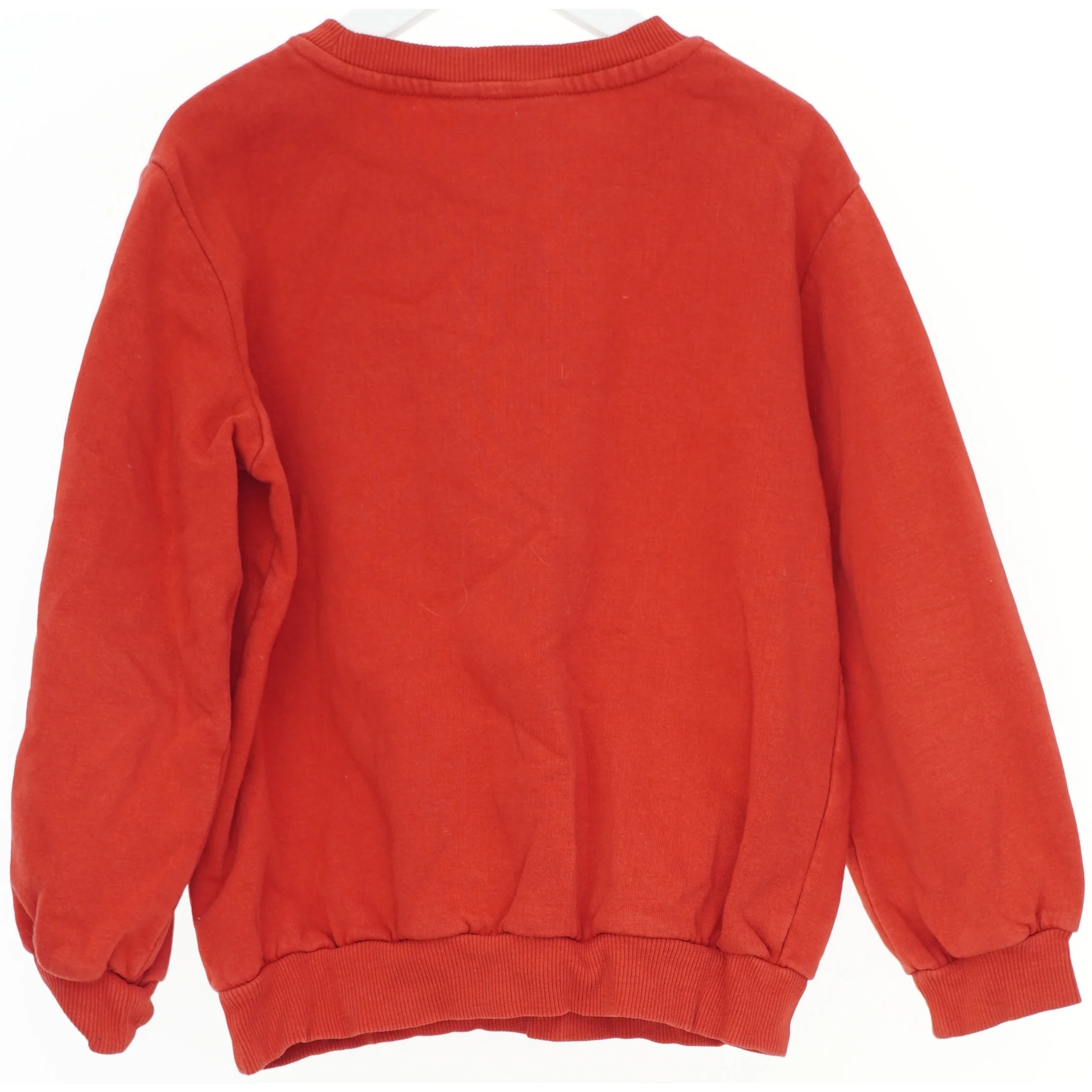 Rød sweatshirt med paillet-sløjfe fra H&M (str. 128)