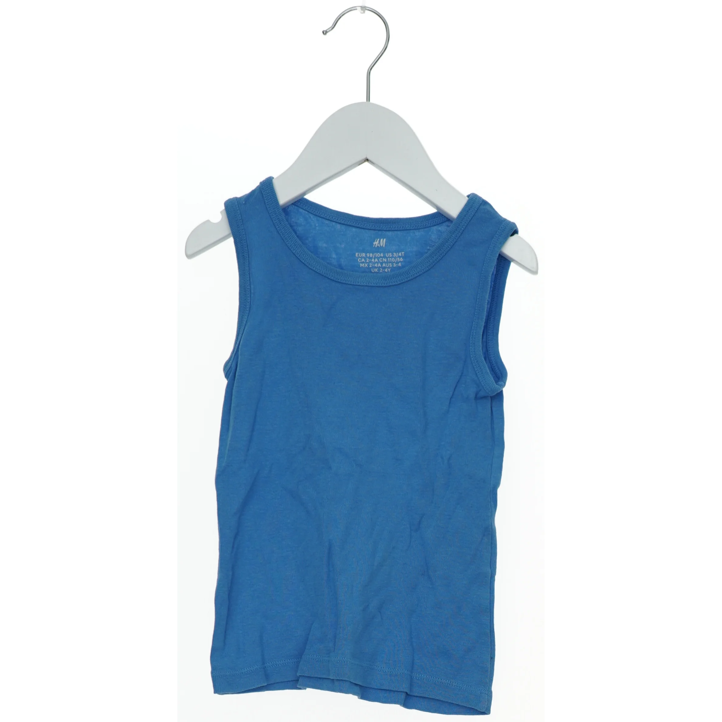 Blå tanktop fra H&M (str. 98)