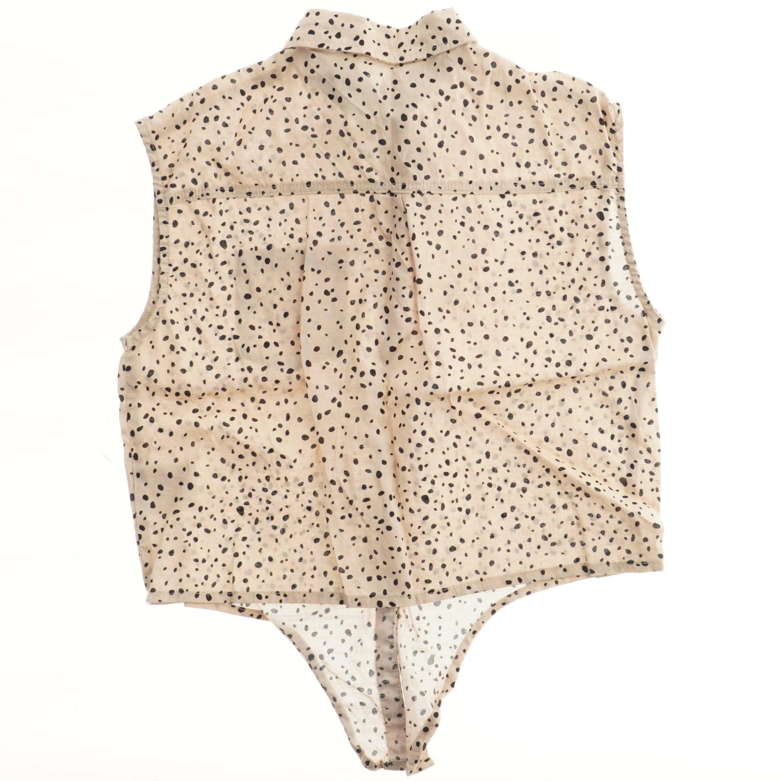 Prikket mouwløs bodystocking fra H&M (str. 146)