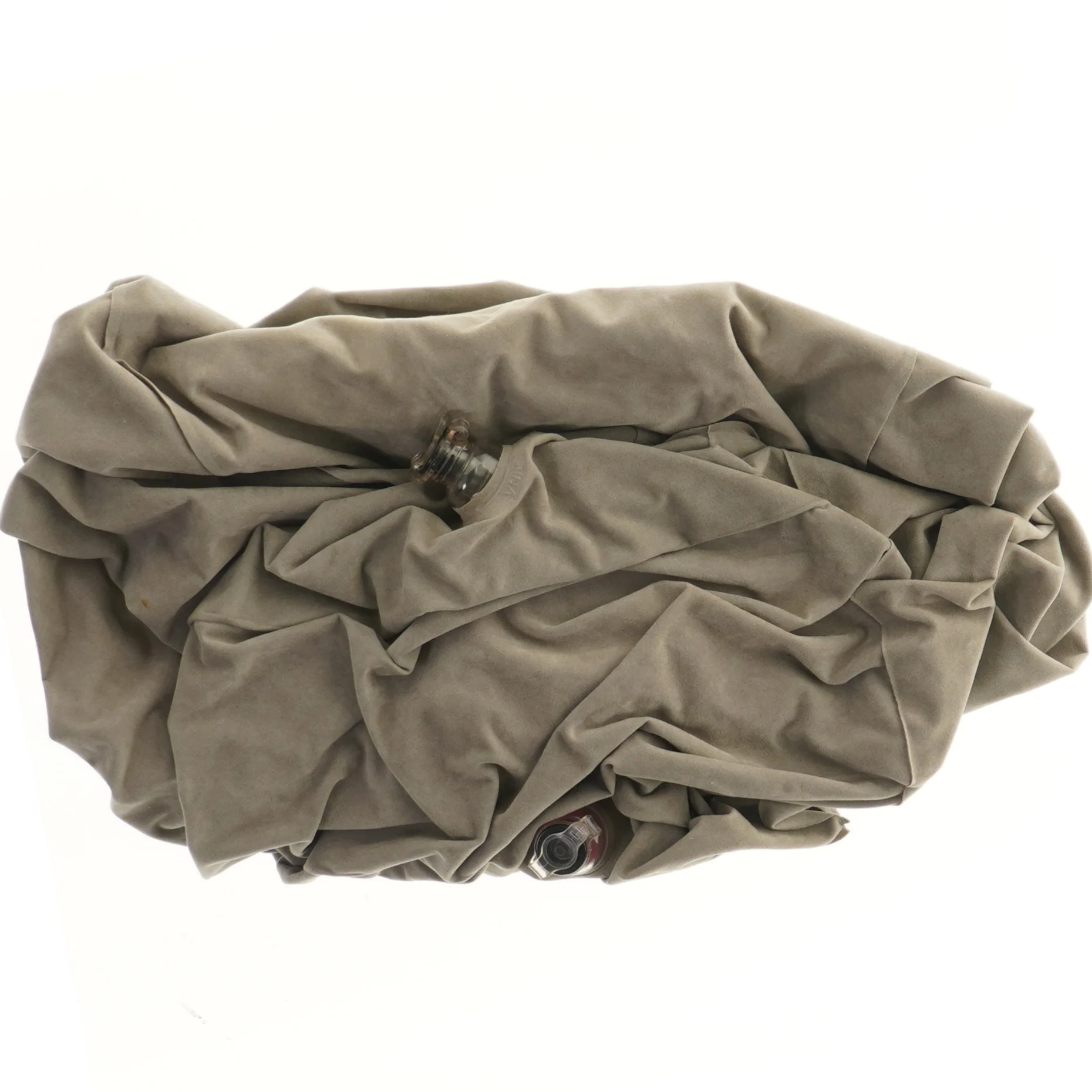 Grå oppustelig fodstøtte pude.