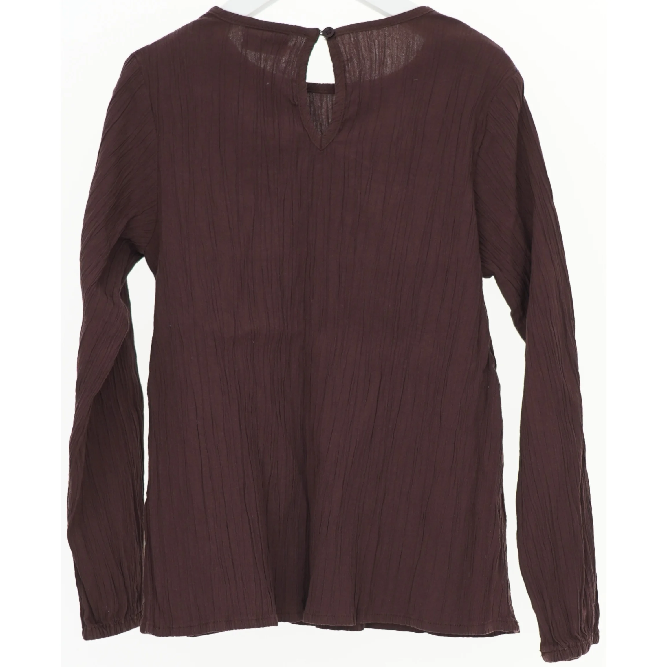 Langærmet bluse fra Friends (str. 134)