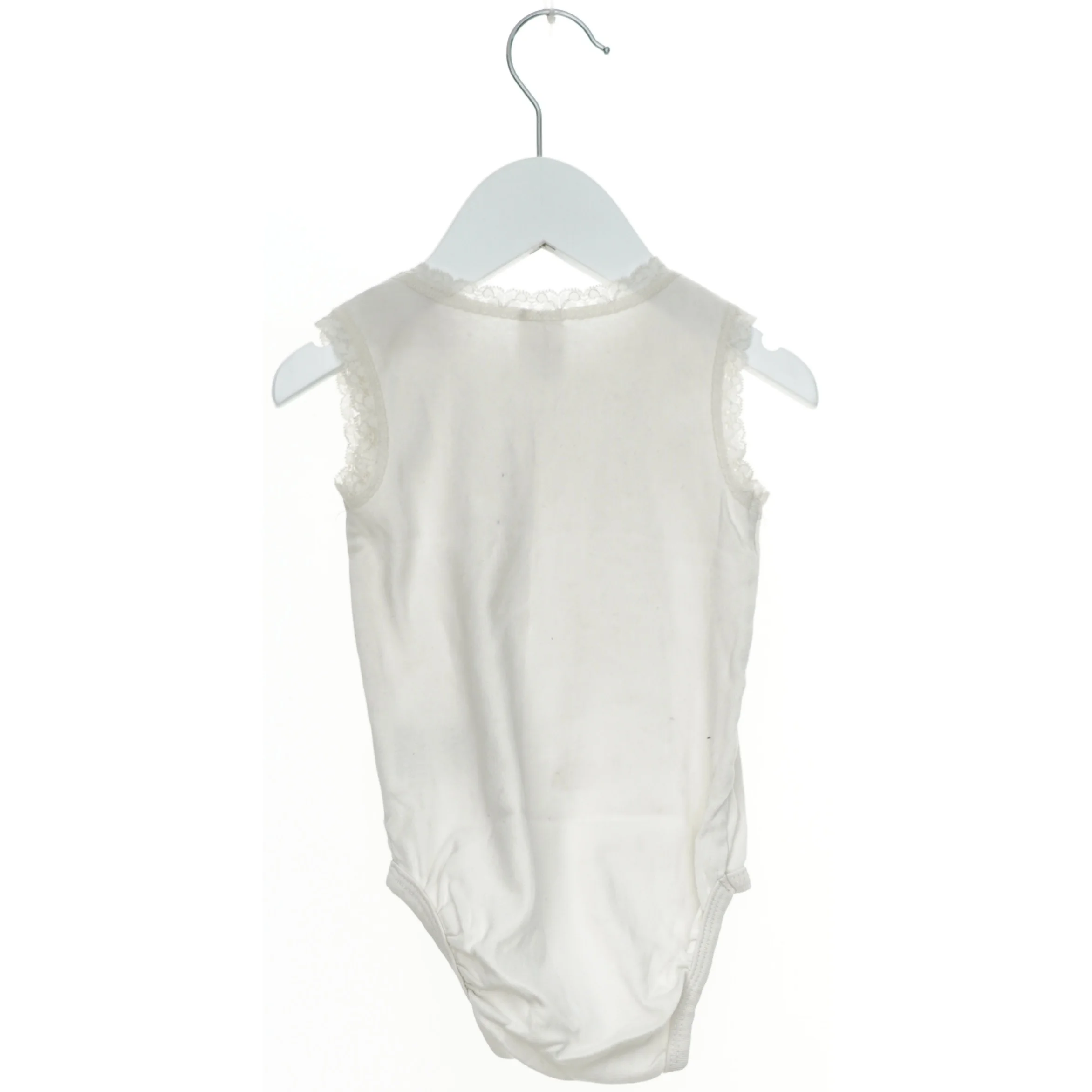 Hvid bodystocking til baby fra H&M (str. 86)